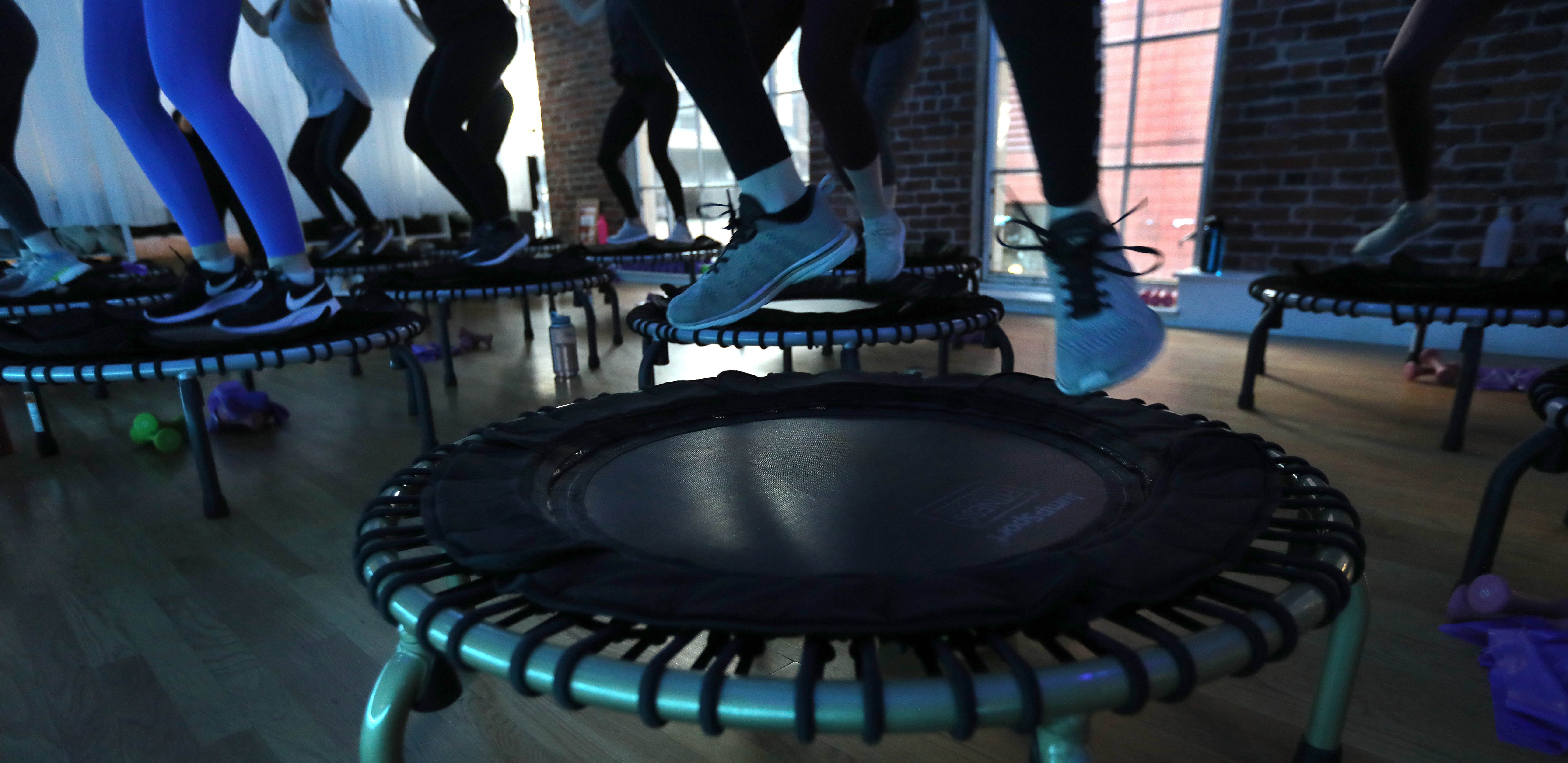 Single-person trampolines, or rebounders, are part of the Bounce and Bands class at Barre Groove.
