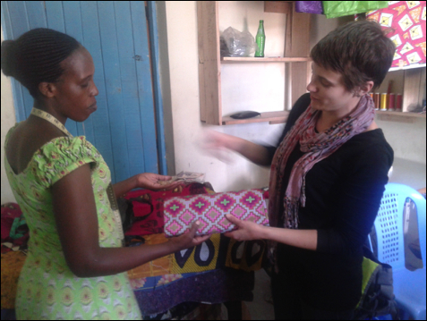 Anderson in Nairobi working with a client for RefugePoint.