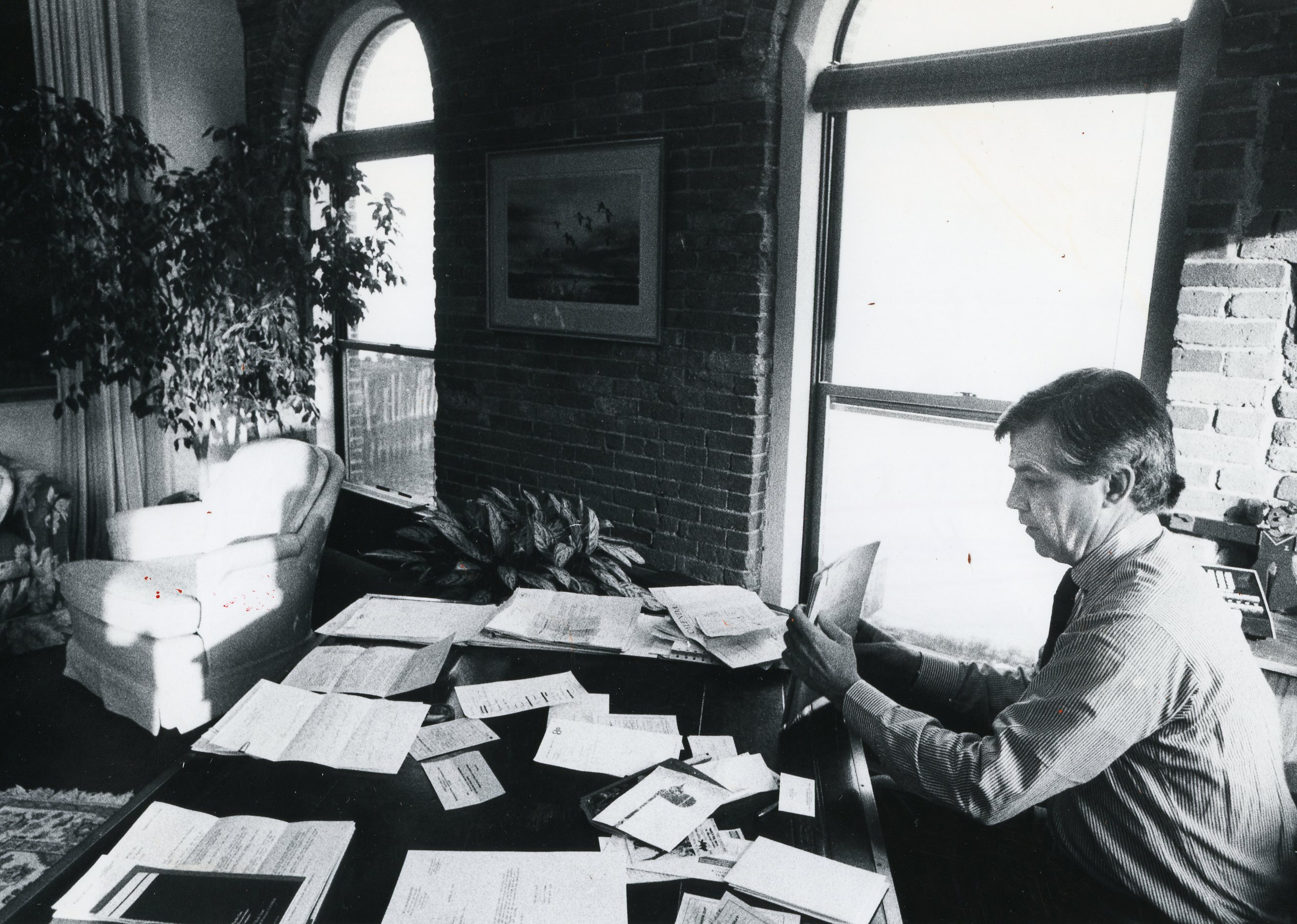 Hostetter at work in his Lewis Wharf office in 1981. He retains an office there to this day.