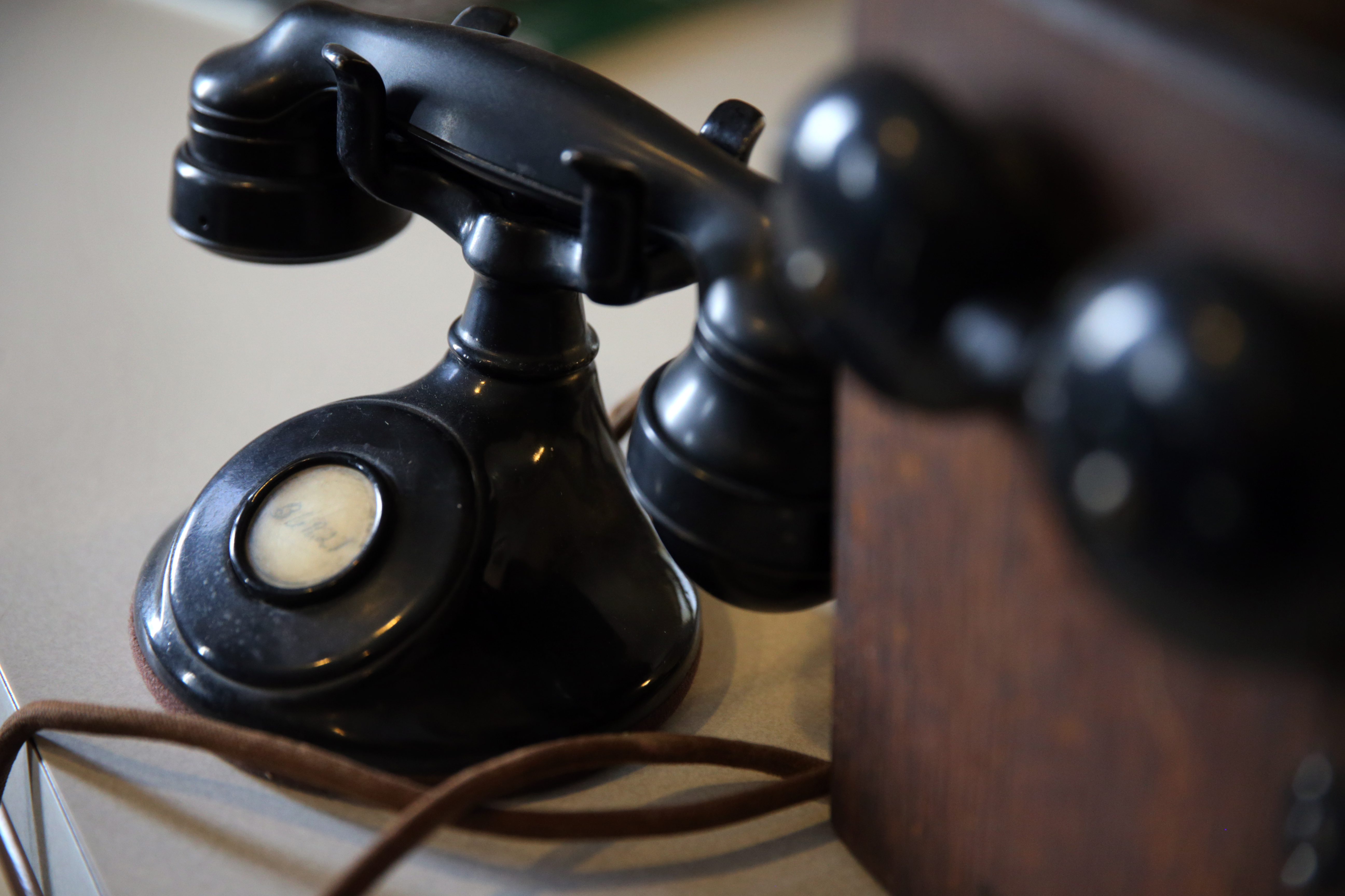The company still displays antique phones at its office.