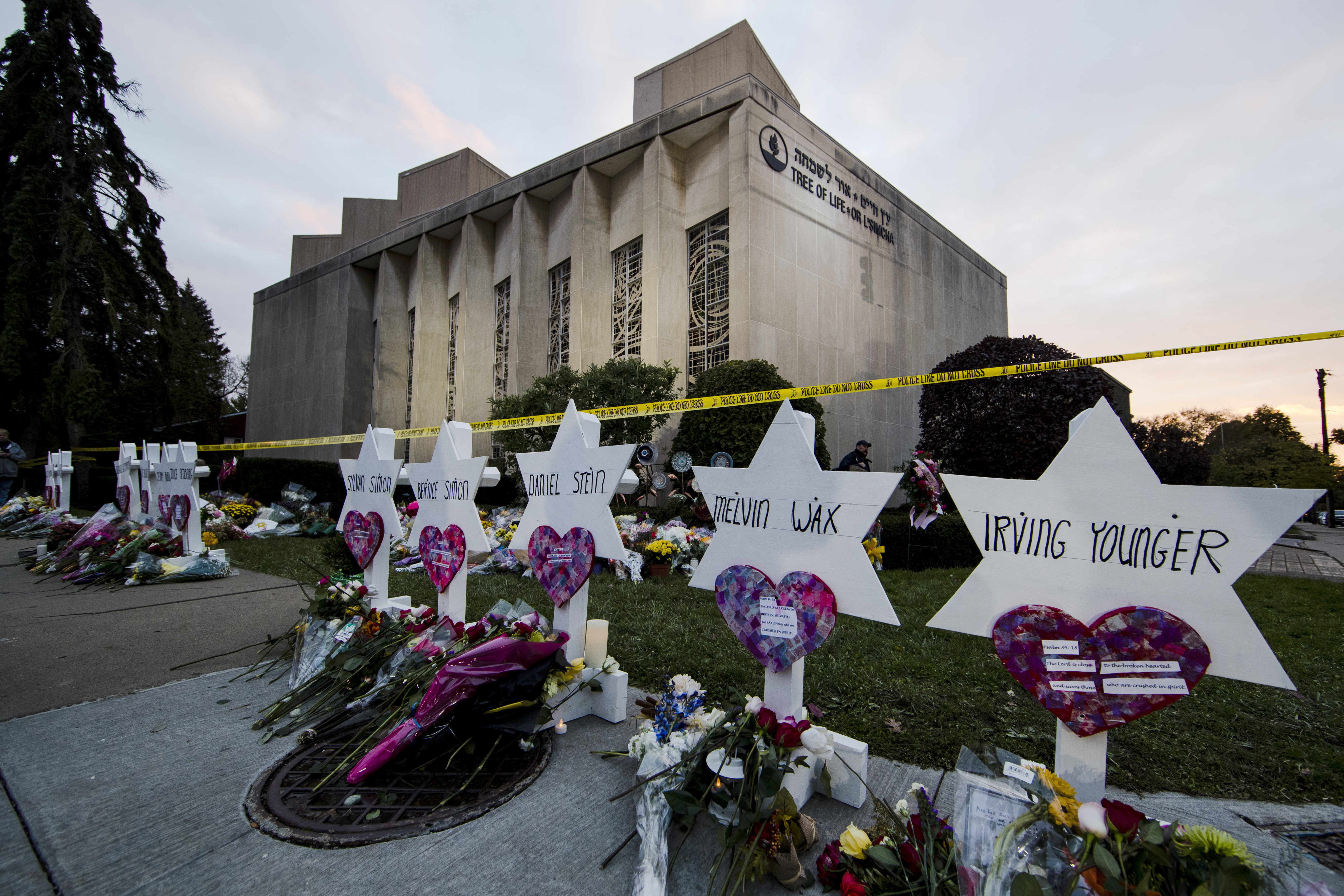 File - In this October 2018 photo, a makeshift memorial stands outside Pittsburgh's Tree of Life Synagogue in the aftermath of a deadly shooting. Eleven people were killed.