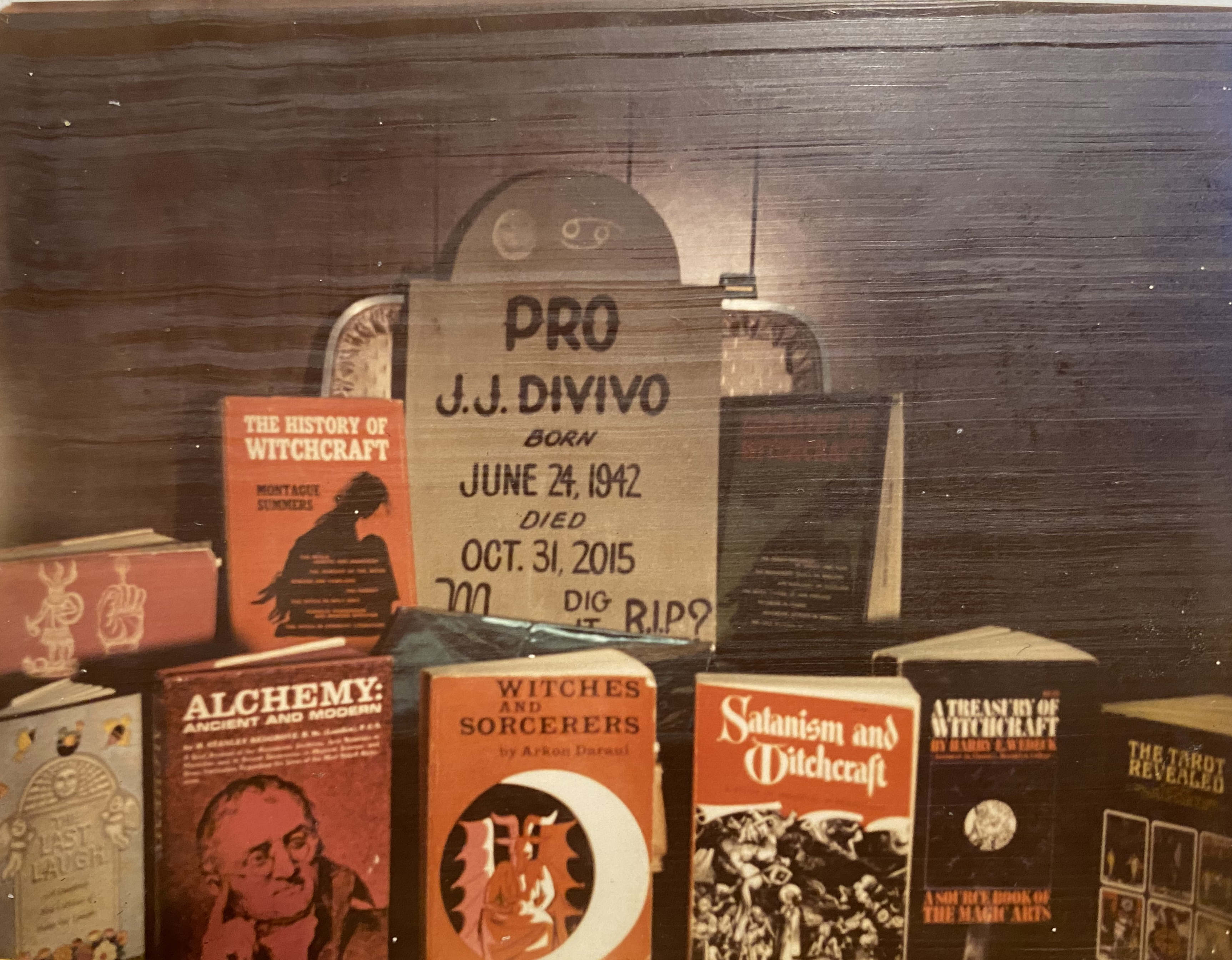 In Divivo’s checked luggage, a State Police detective found occult books and a homemade tombstone.
