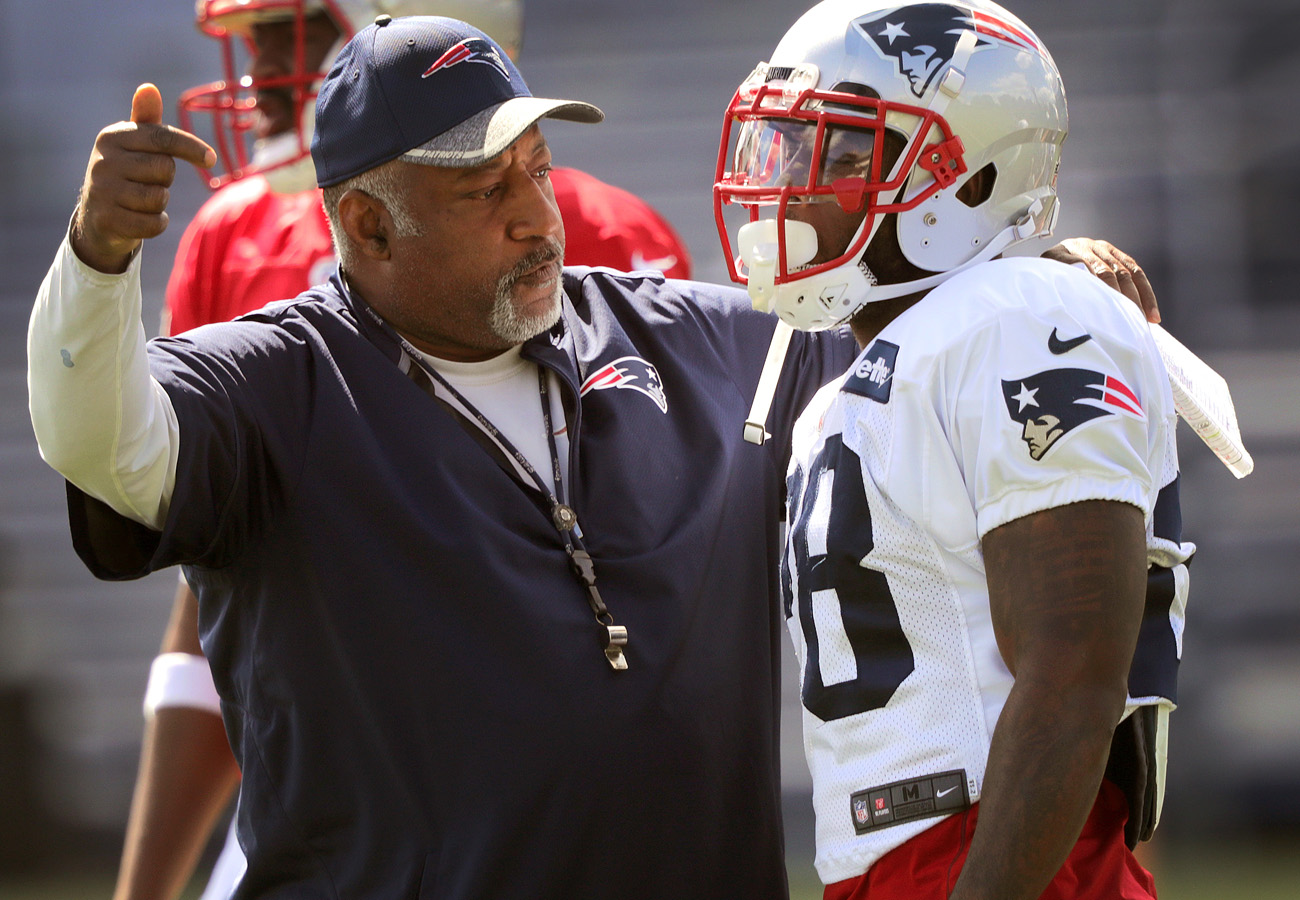 Running backs coach Ivan Fears, seen here chatting with James White in 2016, acknowleges the running game has struggled this season.
