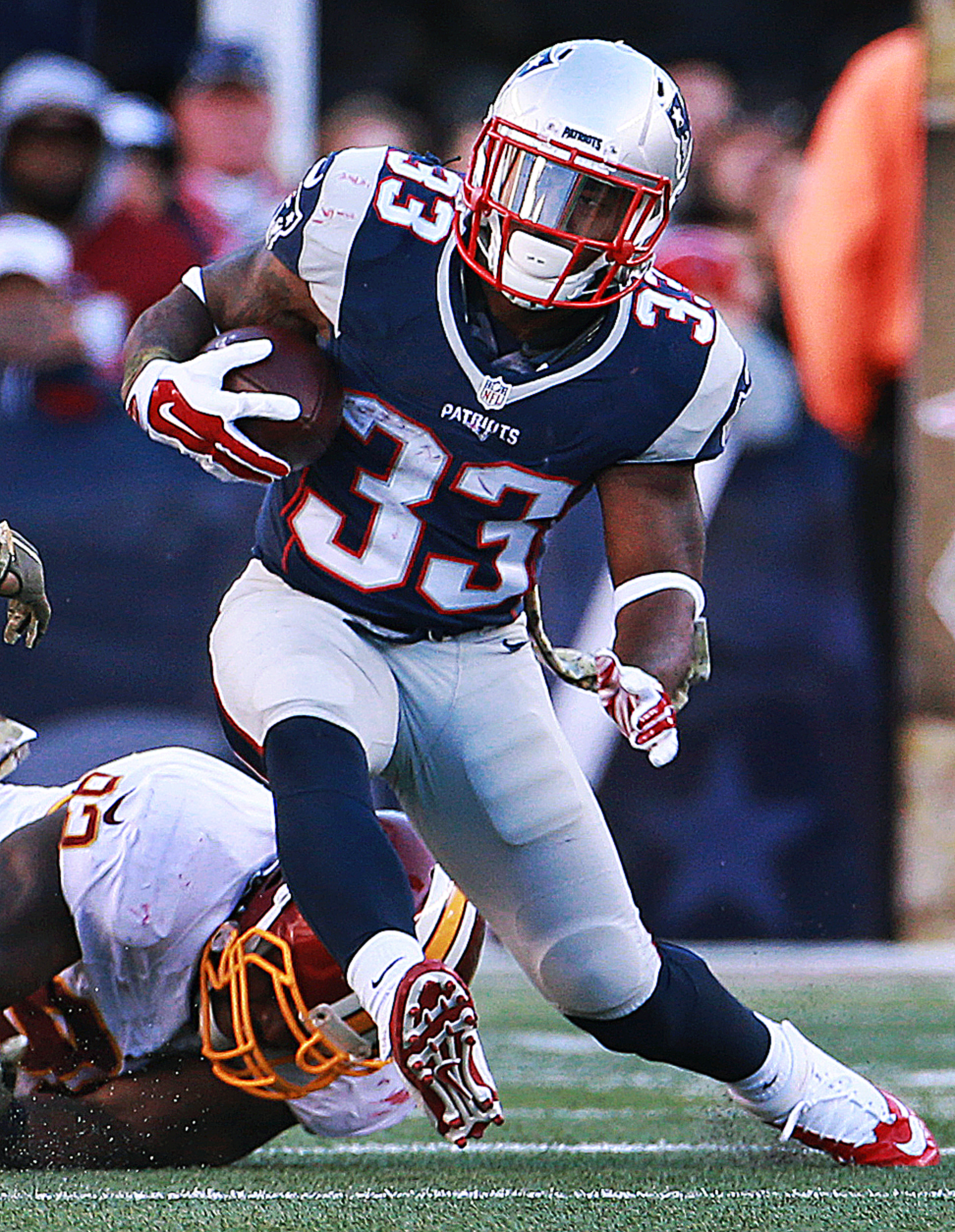 This is the play on which Patriots running back Dion Lewis injured his knee Sunday.