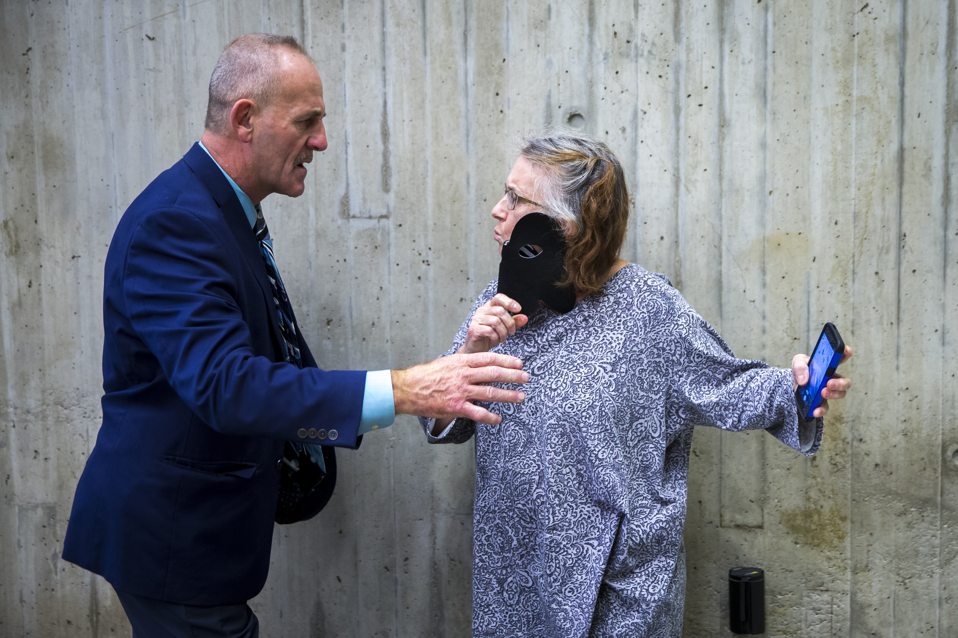 Bill Joyce, chief of security for Boston City Hall, attempted to grab the phone of Mary Landale of Watertown after she used it to record him before the hearing. Joyce told Landale she could not wear a mask during the hearing.