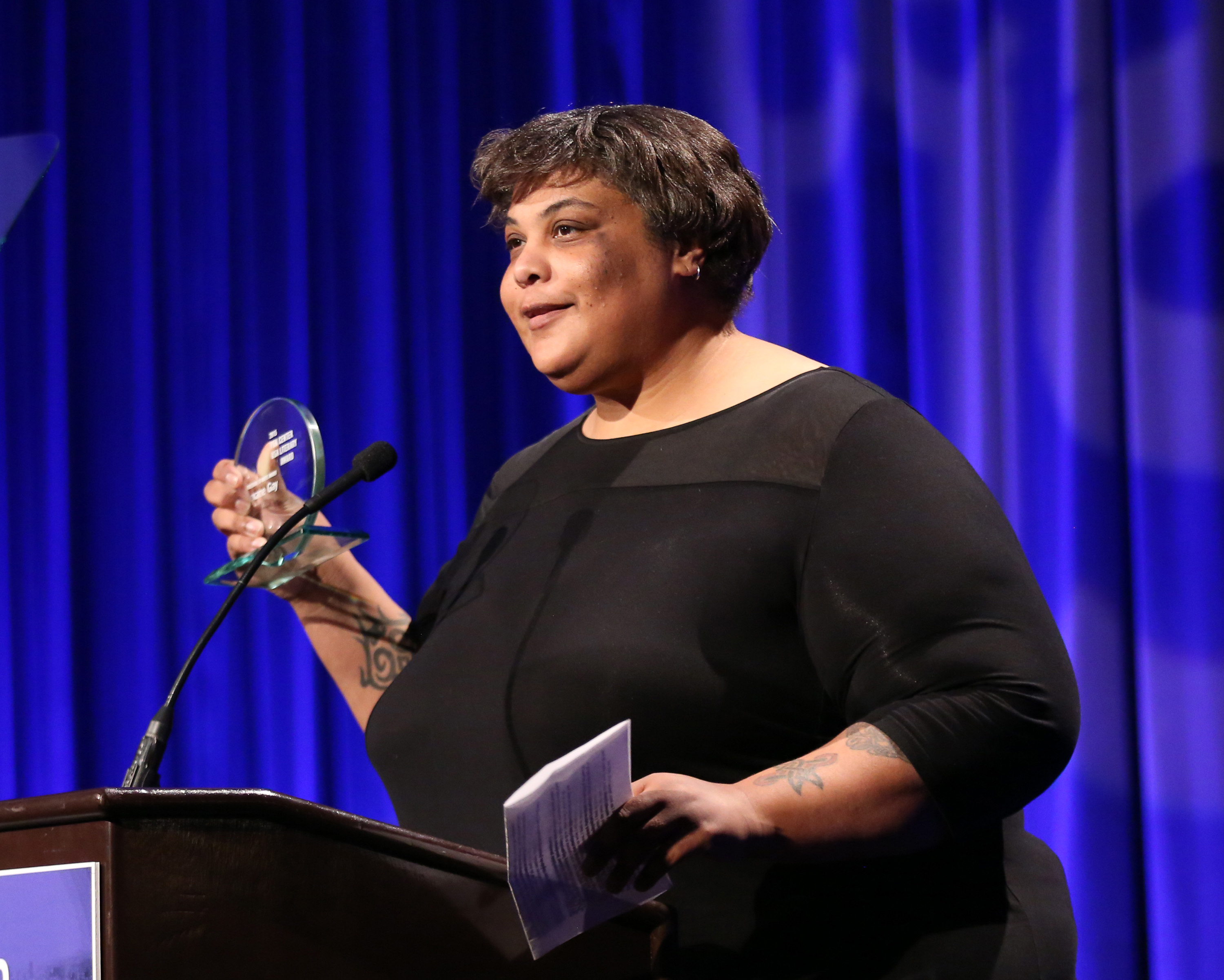 In this file photo, Roxane Gay accepts her Freedom to Write Award at the PEN Center USA's 25th Annual Literacy Awards Festival at the Beverly Wilshire Hotel on Monday, Nov. 16, 2015, in Beverly Hills, Calif.