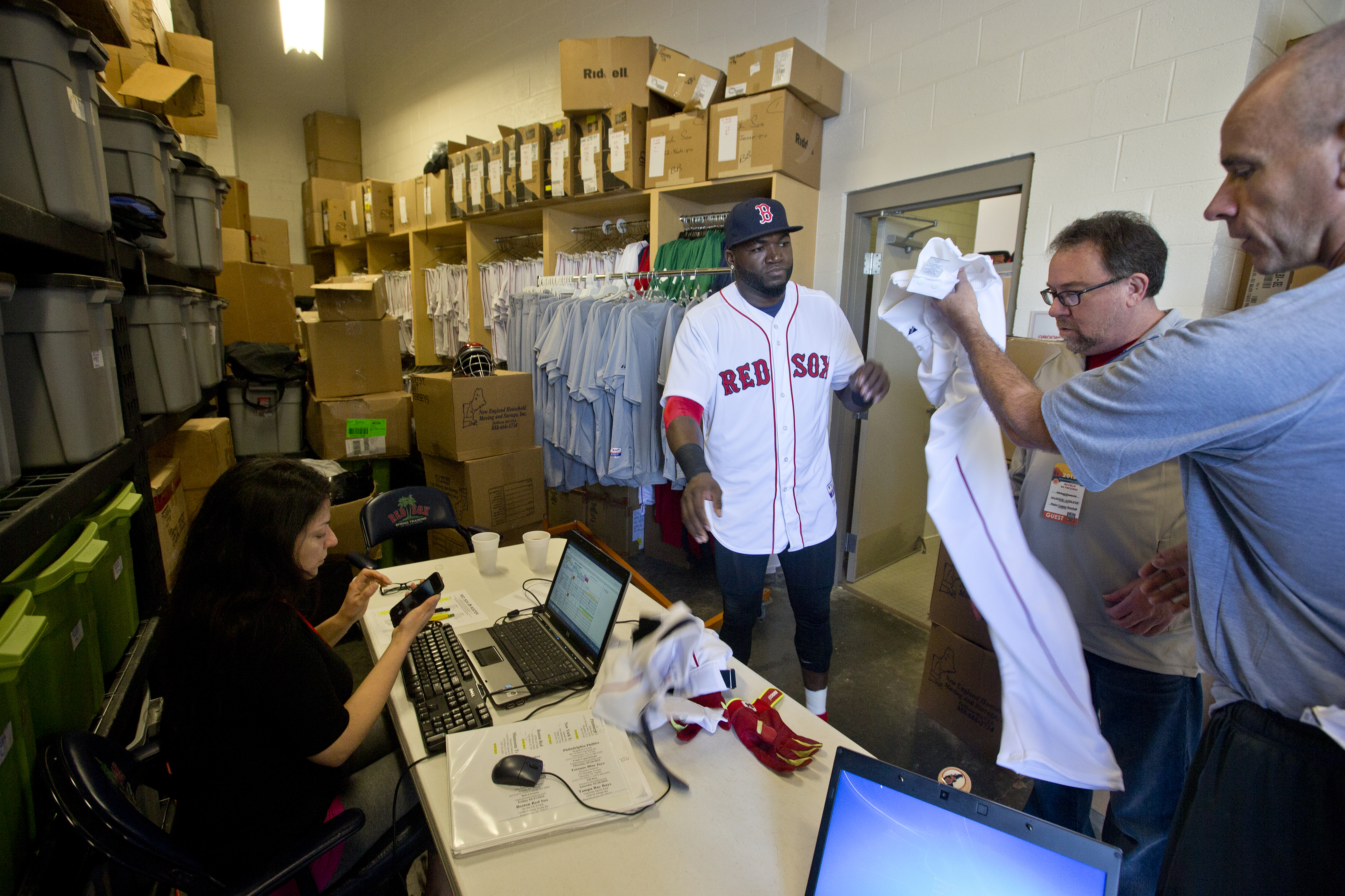David Ortiz (center) went through the fitting process with Michael Panuccio.
