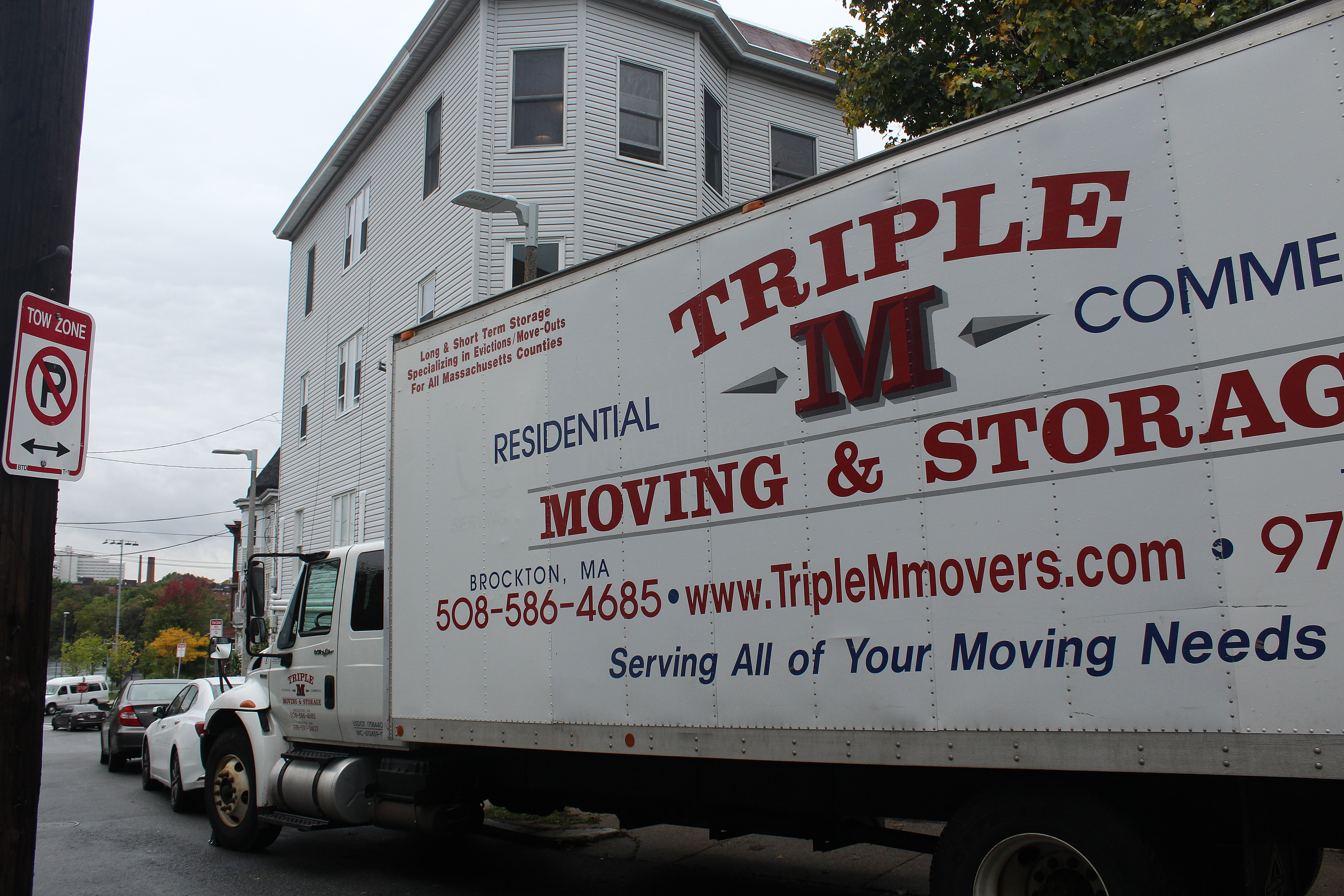 The small type on a moving truck that arrived at Jerome Stanley’s longtime home says “Specializing in Evictions/Move-Outs.”