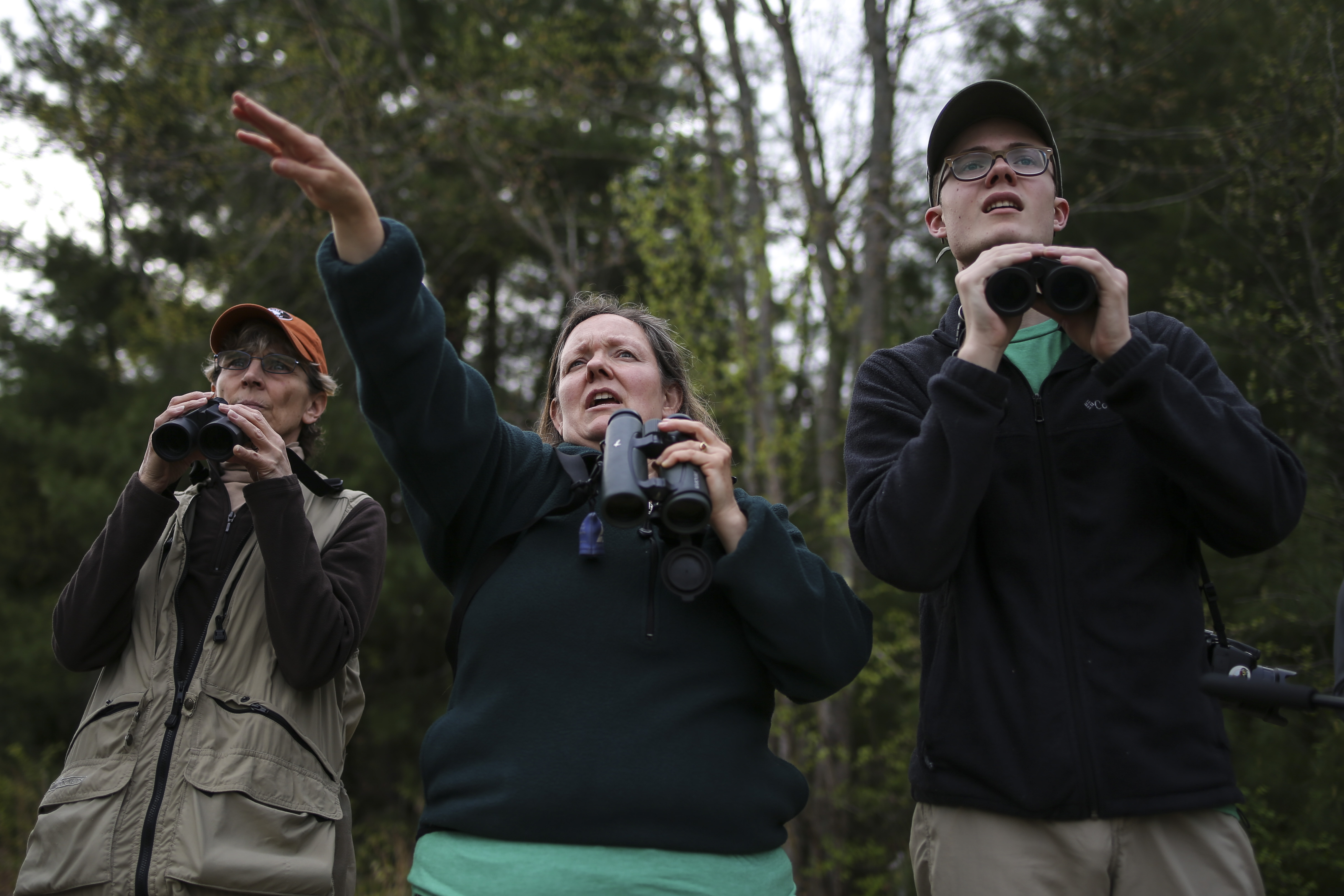 From left: Diane Saari, Gwen Shipley and Tim Swain, 17, scouted for birds in Lancaster.