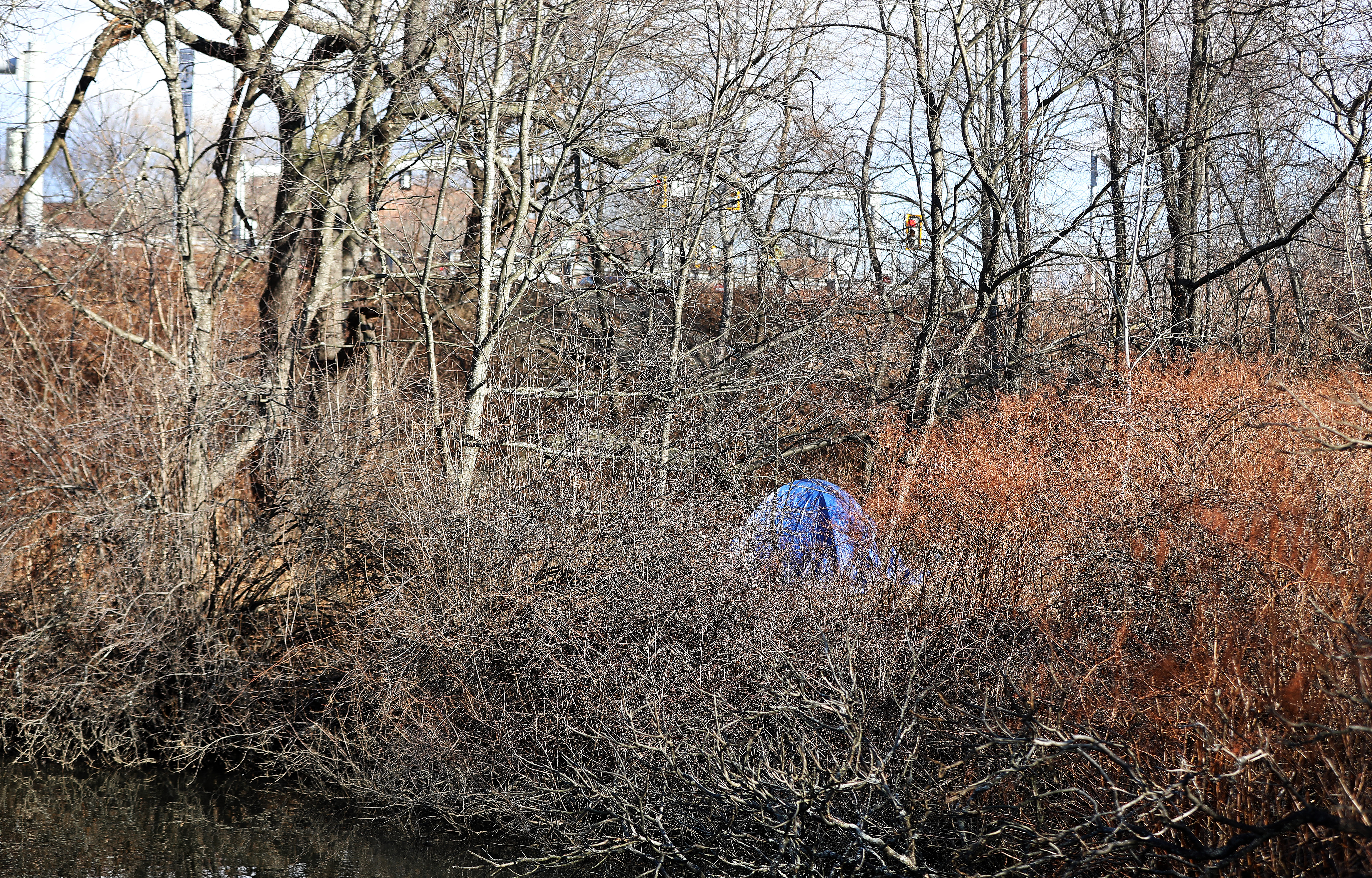 A tent could be seen not far from the walkway and underpass.
