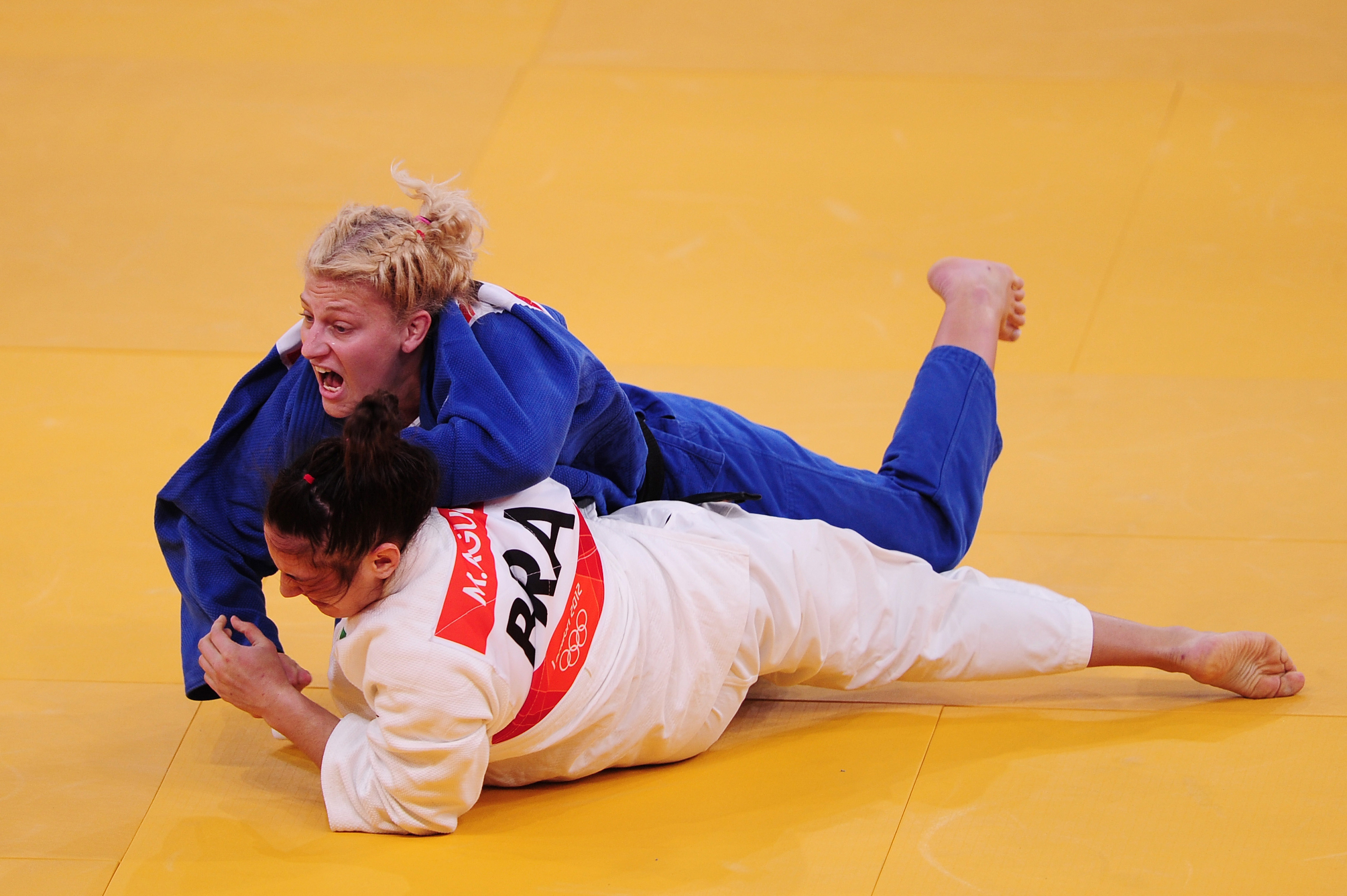 At the London Games, Kayla Harrison became the first American to win the gold in judo. Here, she competes against a Brazilian athlete.