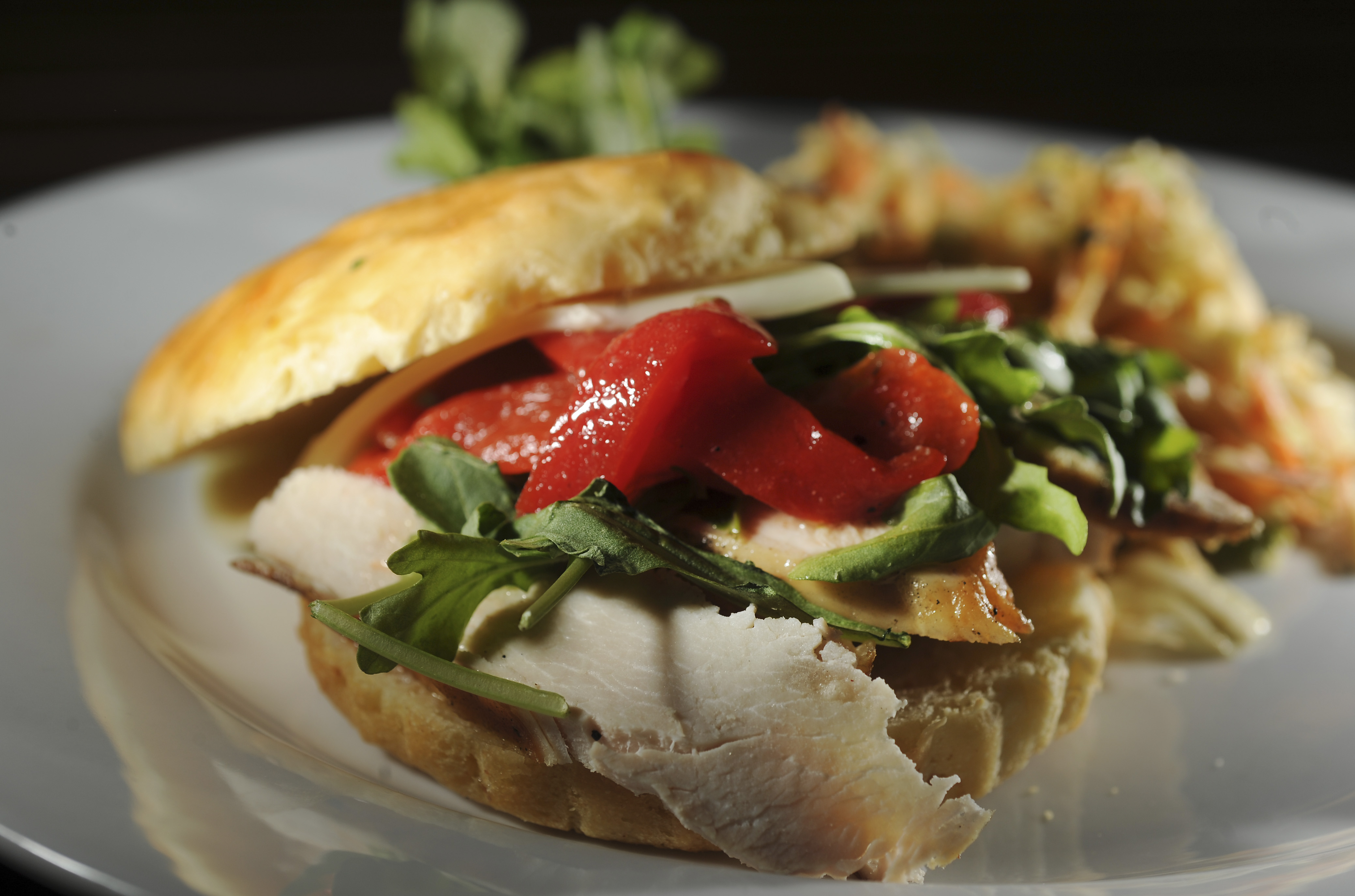 At Back Deck, a grilled Tuscan chicken breast sandwich, which can be ordered on gluten-free breads.