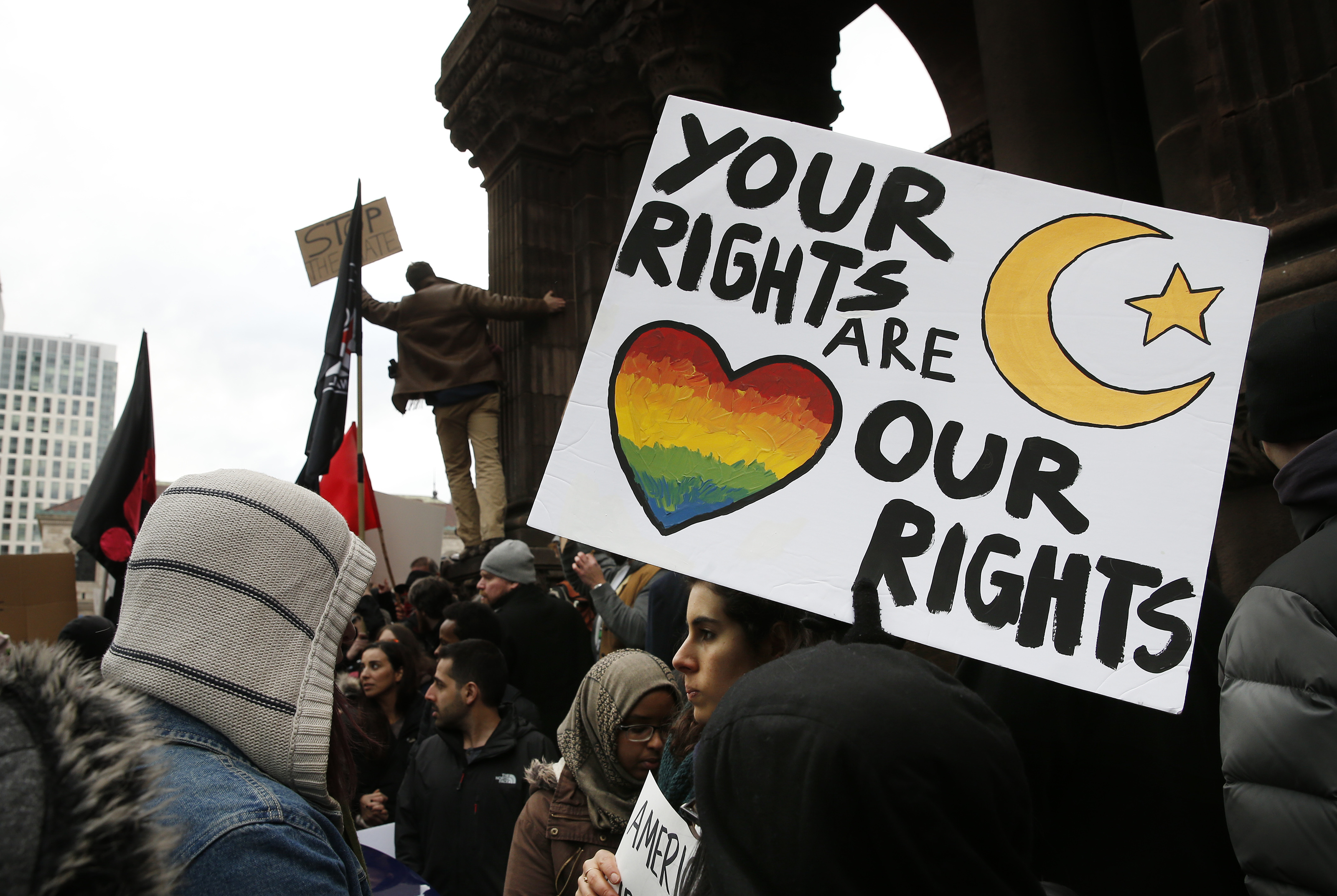 The Copley protest followed a similar demonstration at Logan Airport Friday night.