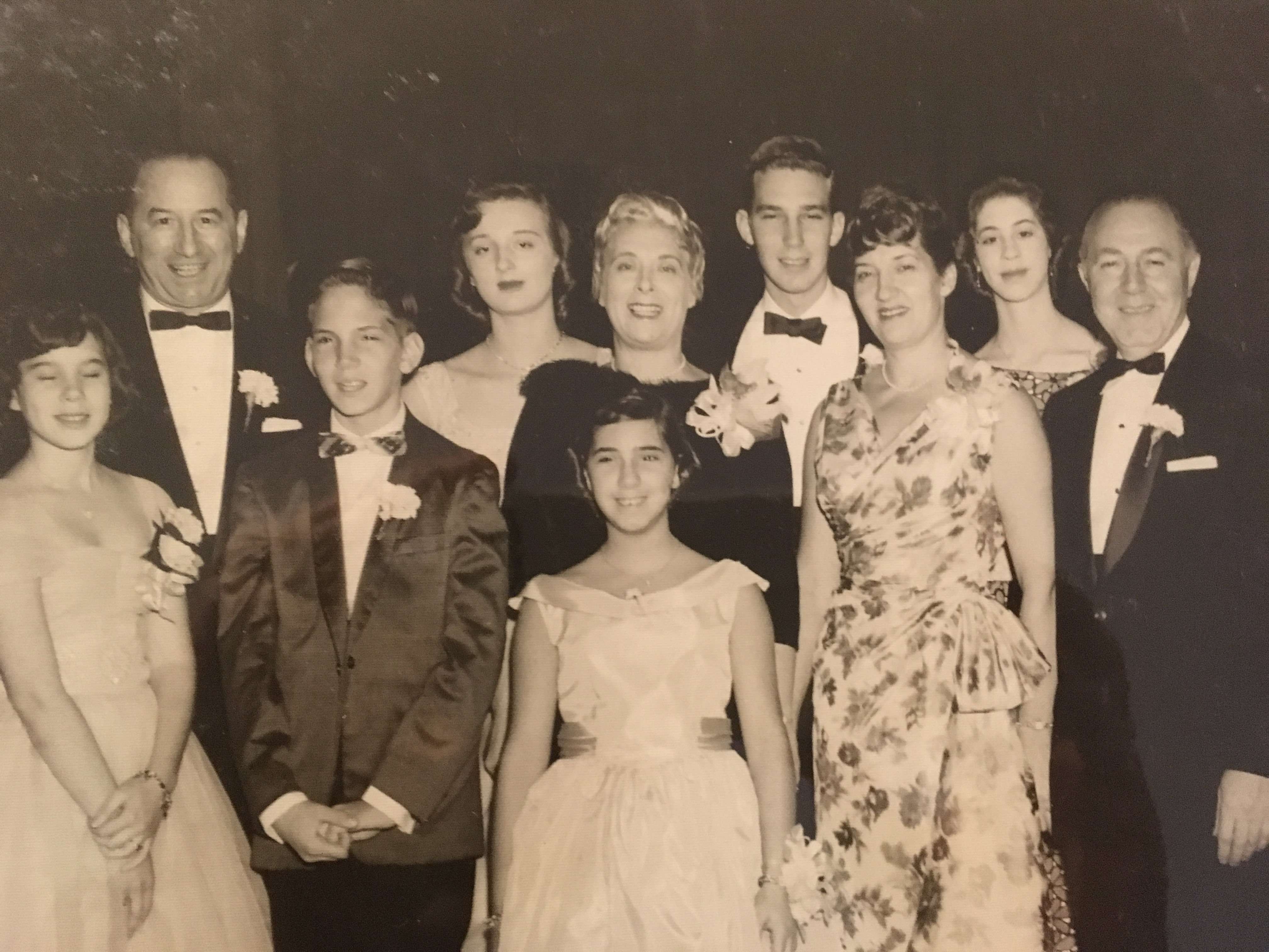 The Waldman and Carver families at a 1959 bar mitzvah ceremony in Brookline for John Carver. Front row from left: Sheryl Waldman, John Carver, Jacquelyn Carver, Lillian Carver, and Joseph Carver. Back row from left: Jack Waldman, Toby Waldman, Martha Waldman, Thomas Carver, and Lynda Waldman.