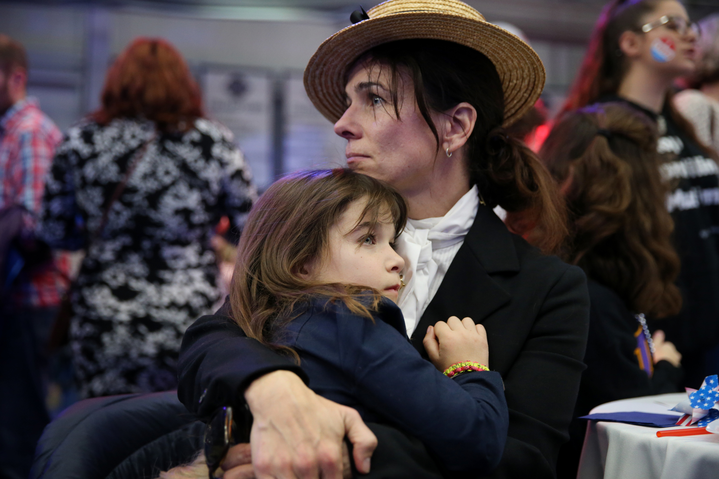 Alicia Fitch comforted her daughter Gwendolyn, 6, while watching election results.