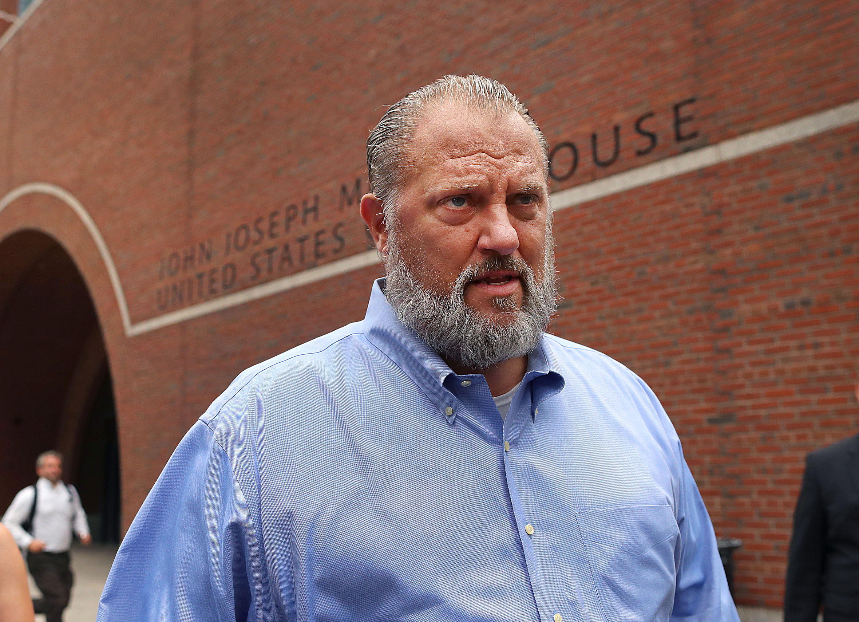 Dana Pullman, former president of the State Police Association of Massachusetts, left the Moakley Federal Courthouse after an afternoon hearing on Aug. 20.