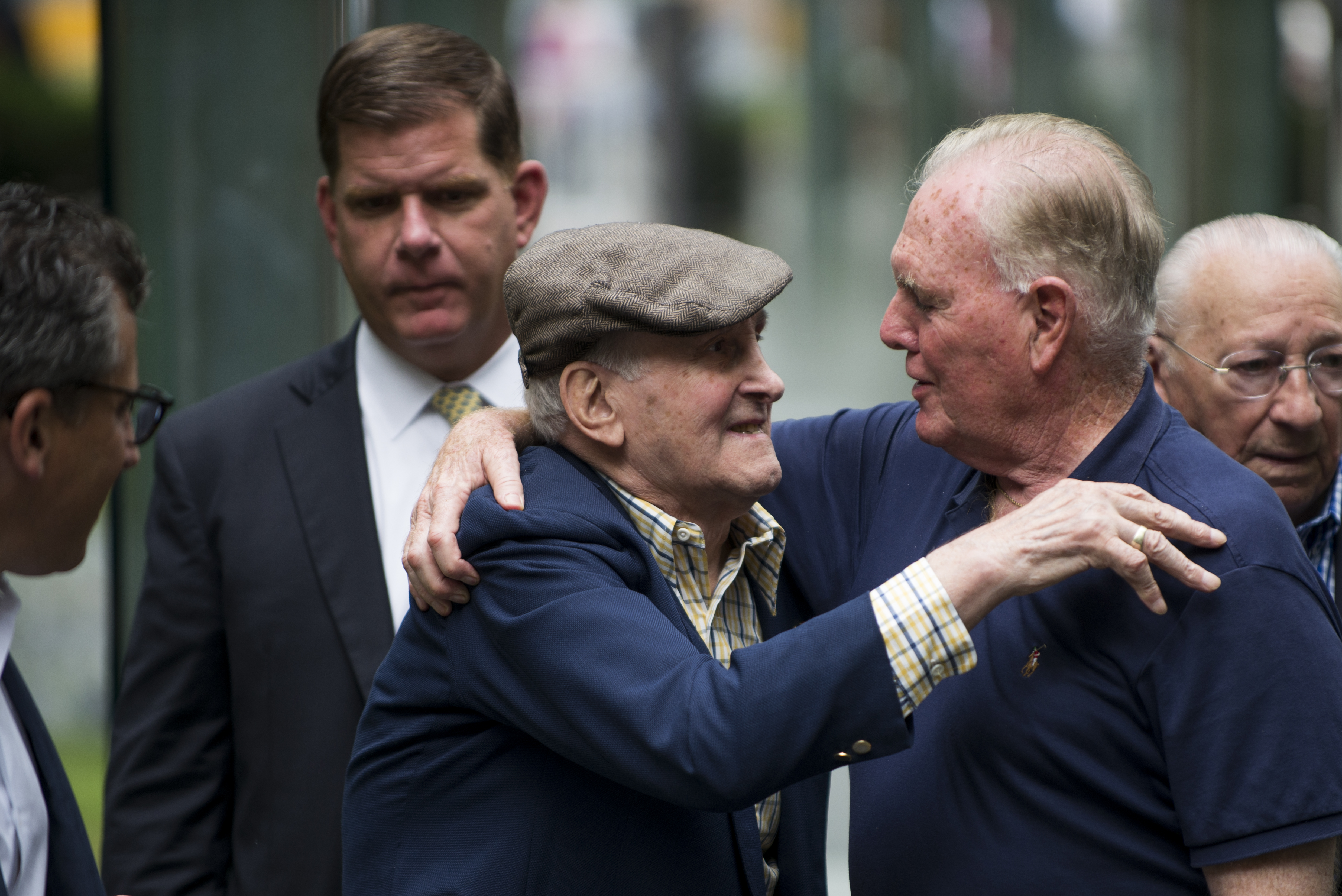 Stephen Ross, a Holocaust survivor and one of the memorial's founders, embraced former Boston mayor Raymond Flynn during the rededication ceremony of the New England Holocaust Memorial.