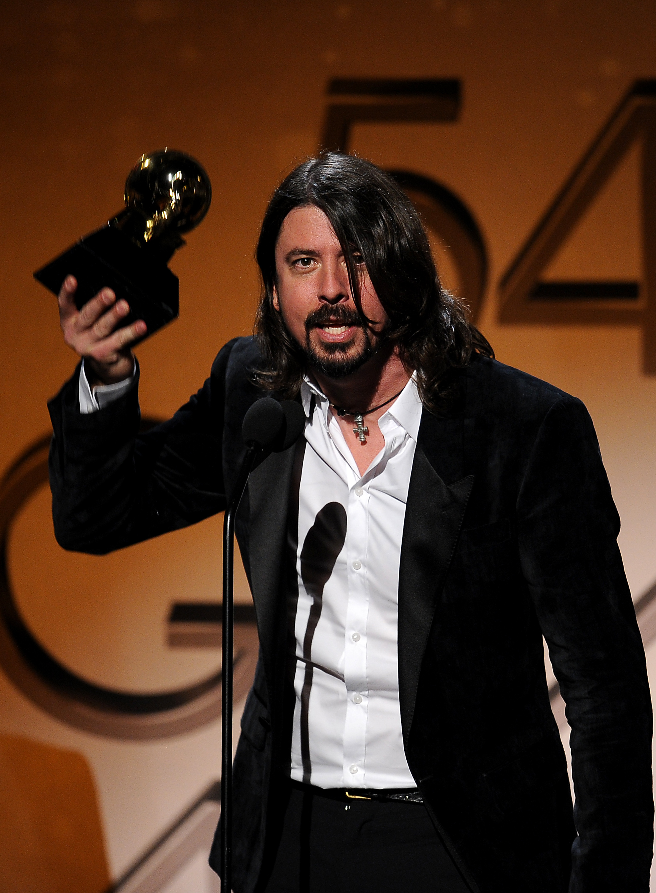 Dave Grohl with one of Foo Fighters’ five awards.