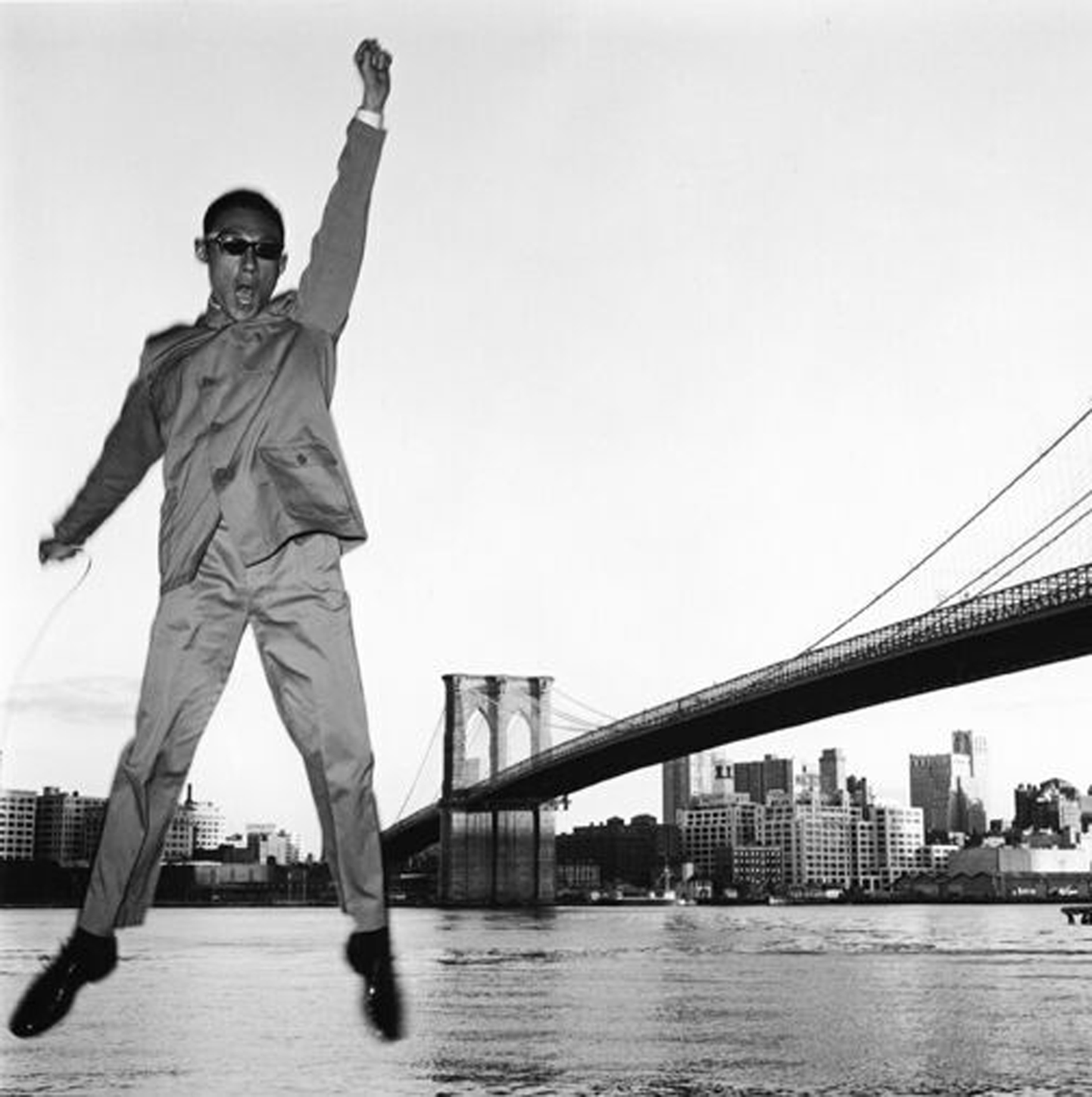 Tseng Kwong Chi’s “New York, New York (Brooklyn Bridge).”