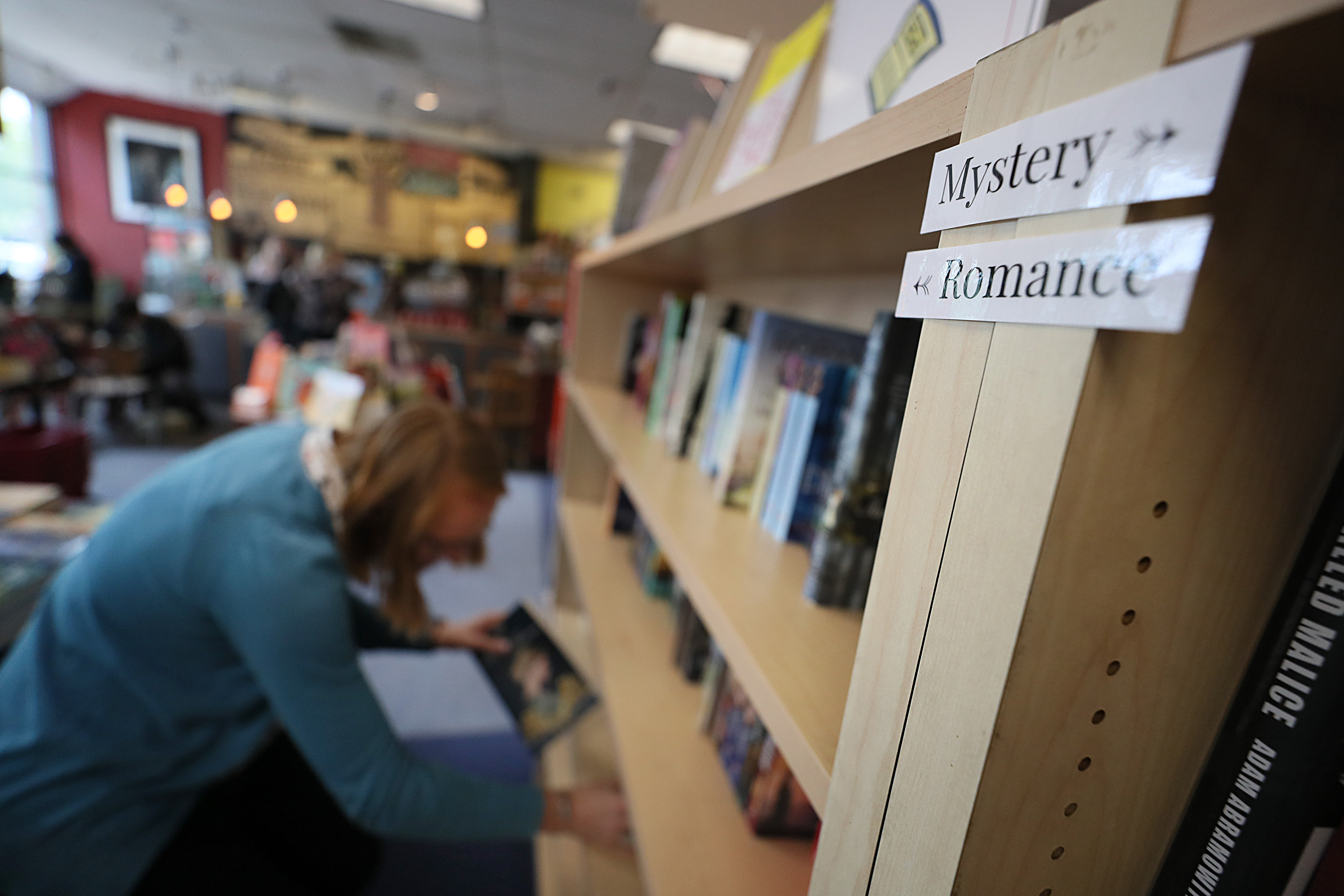 The romance novel section has moved to the front of the store at Porter Square Books.