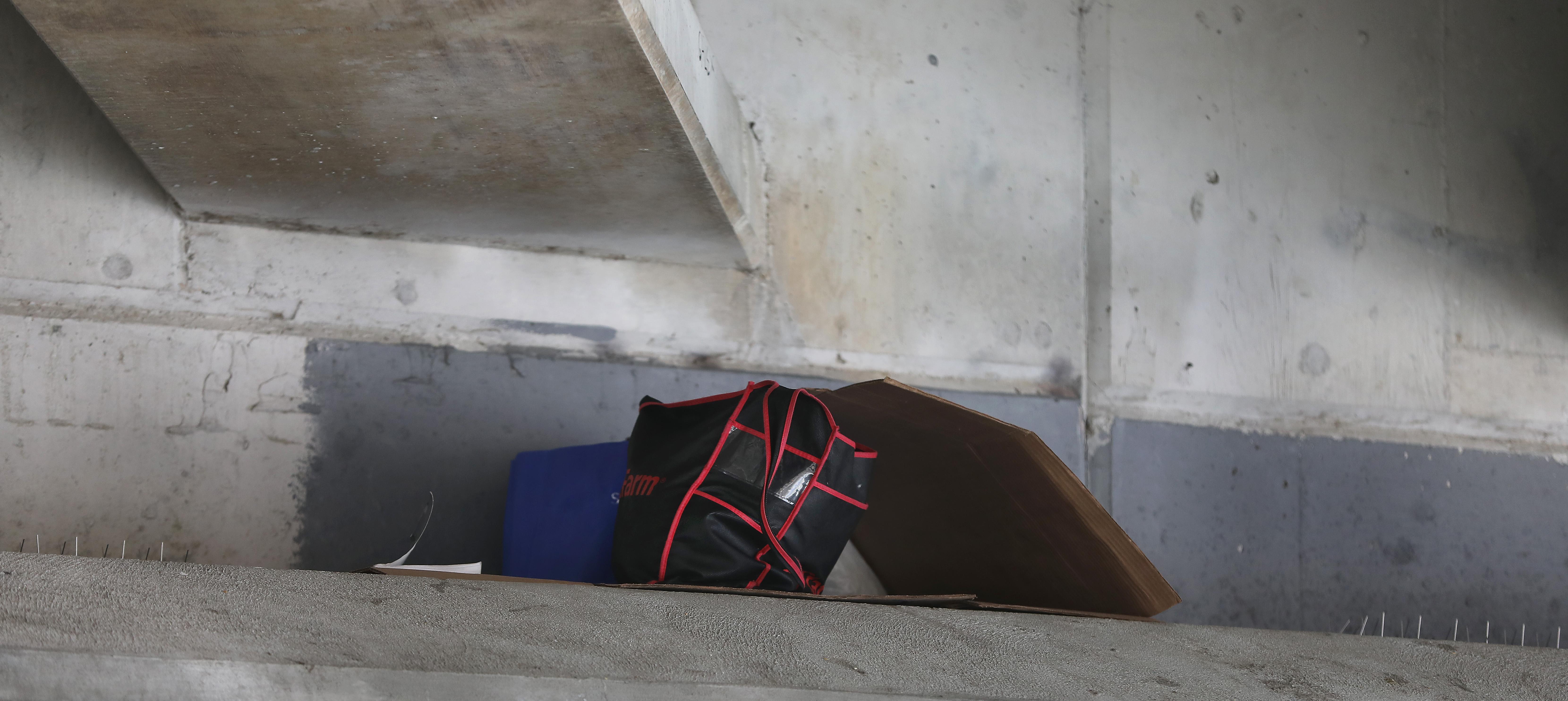 A homeless man’s belongings could be seen underneath the bridge.
