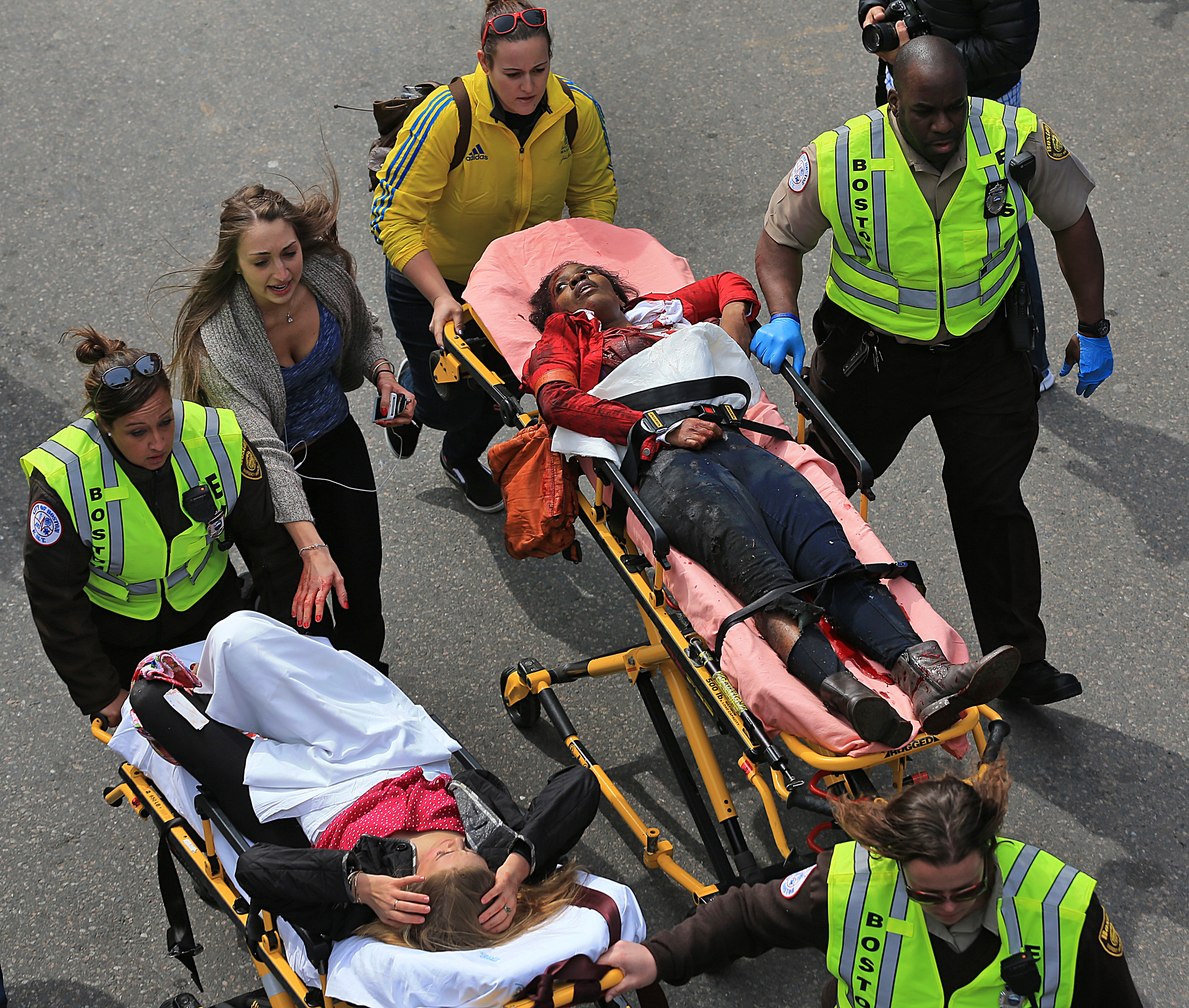 Emergency medical personnel transported the injured for treatment.