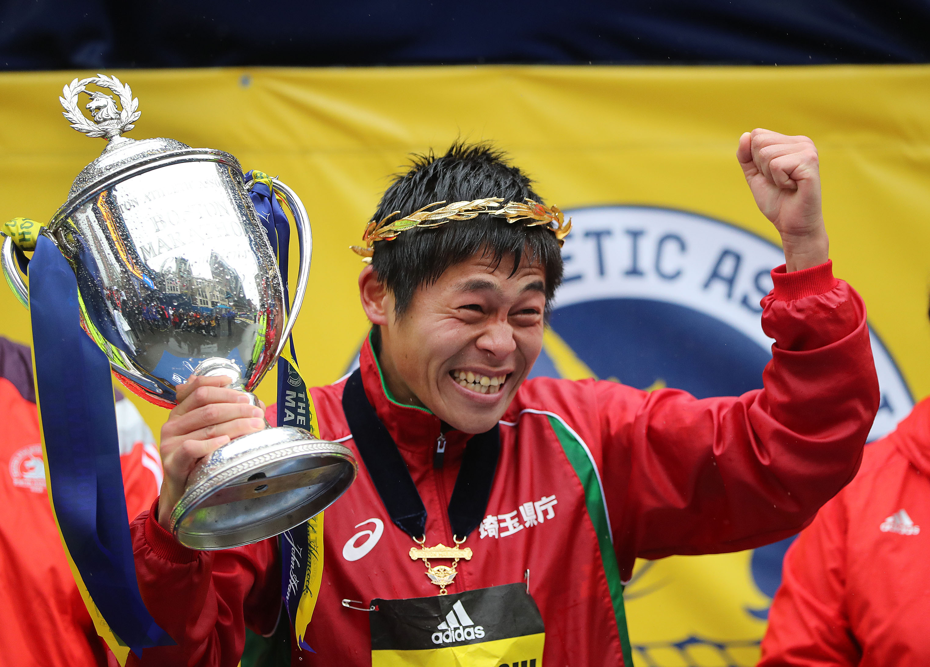 Yuki Kawauchi of Japan celebrates after winning the men’s race at the Boston Marathon.