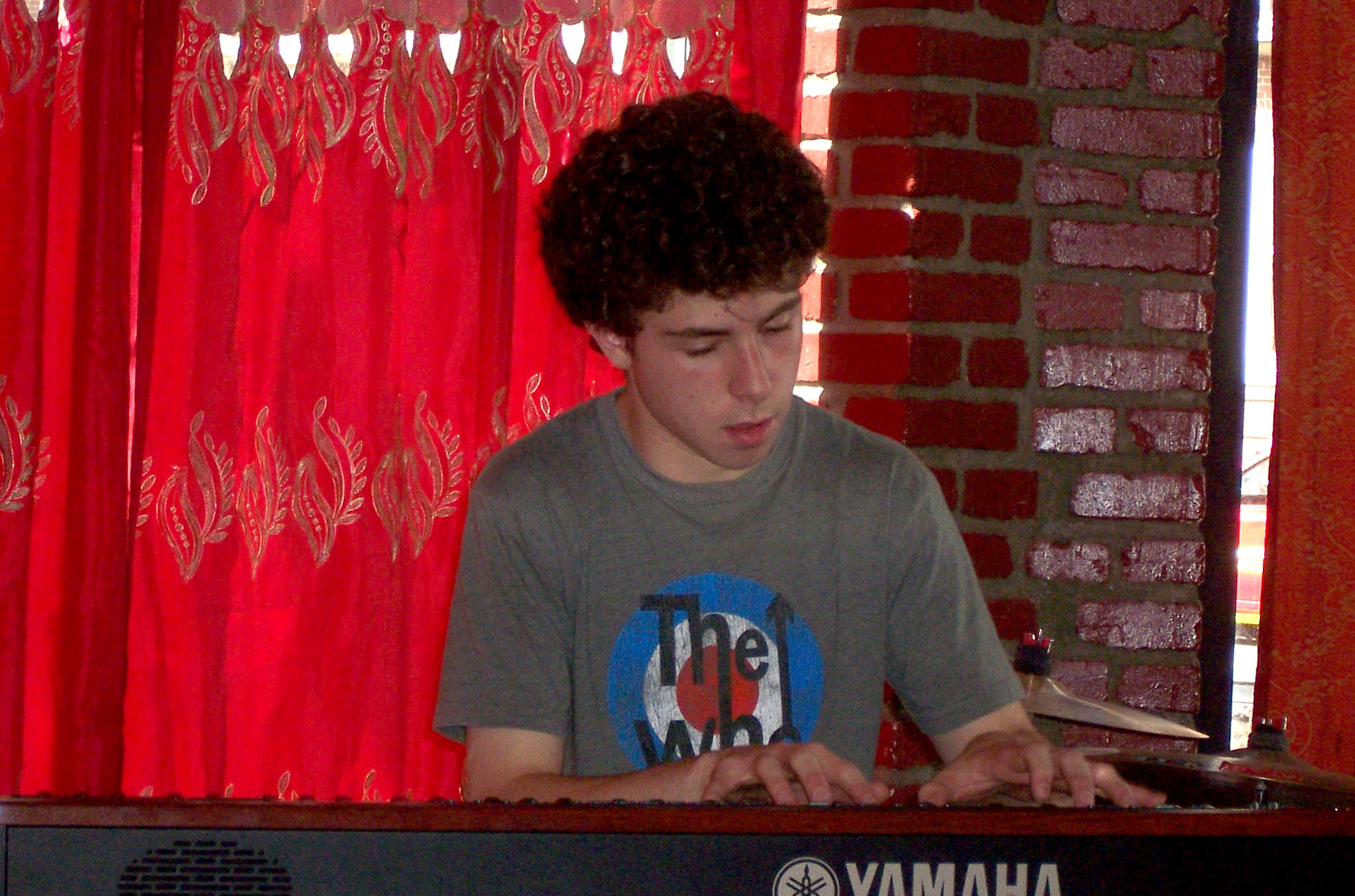 Matthew Aucoin journeyed into playing rock music during his teenage years in a band with his friends.
