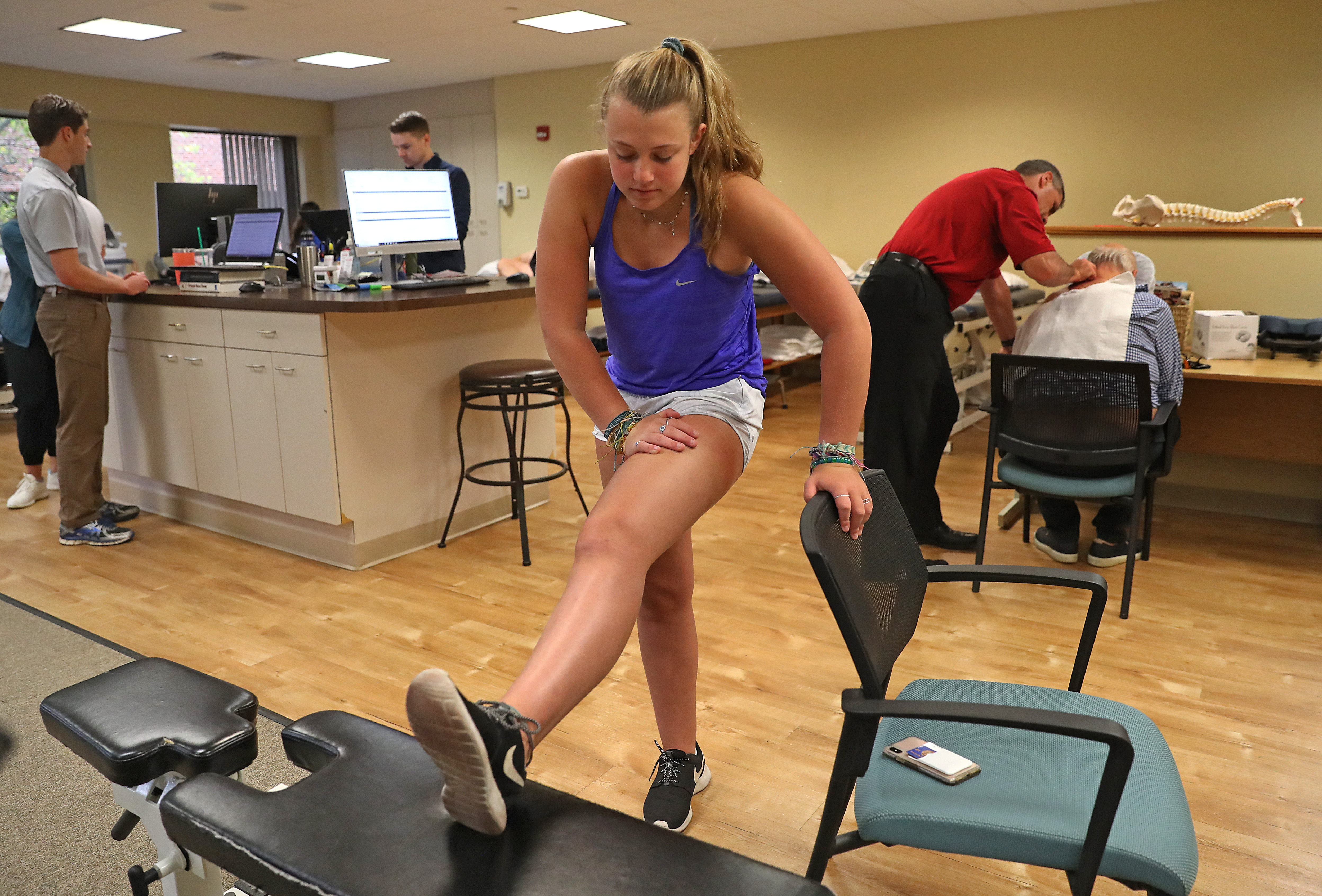 Lewis received physical therapy for her knee: “I want to be a healthy person when I’m older and go to the gym,” she said.
