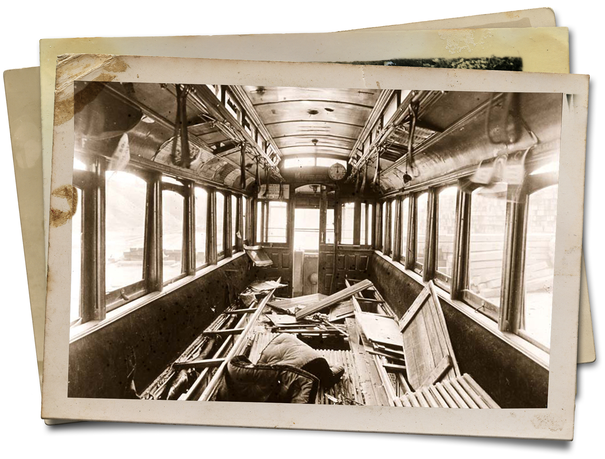 The view inside the 25-foot passenger compartment of Car 393 after it was dredged from the bottom of Fort Point Channel. The damage shows evidence of the passengers’ struggle to escape the submerged car in the dark.