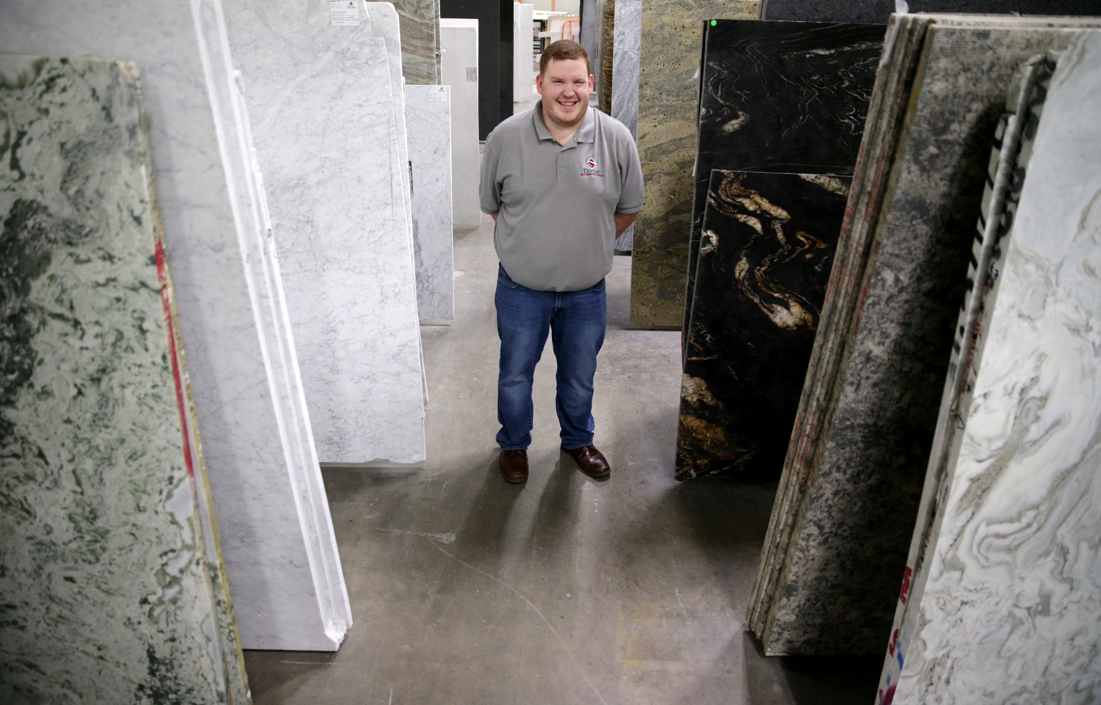 Dakota Lotz works in business development for Divine Stoneworks at the MetroWest Design Center.