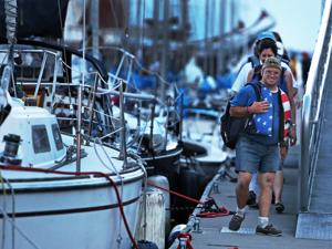Nothnagle flashes a smile while coming ashore after a practice run in Boston Harbor.
