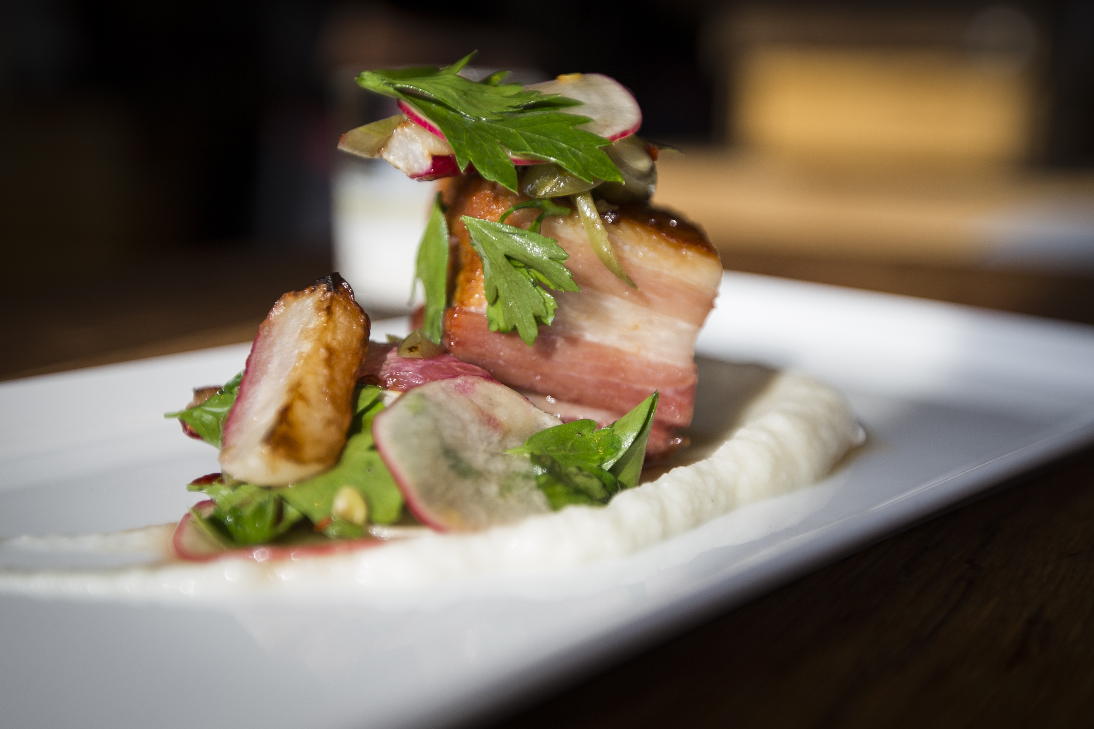 Bourbon-bathed pork belly at the Backroom at Moody’s.
