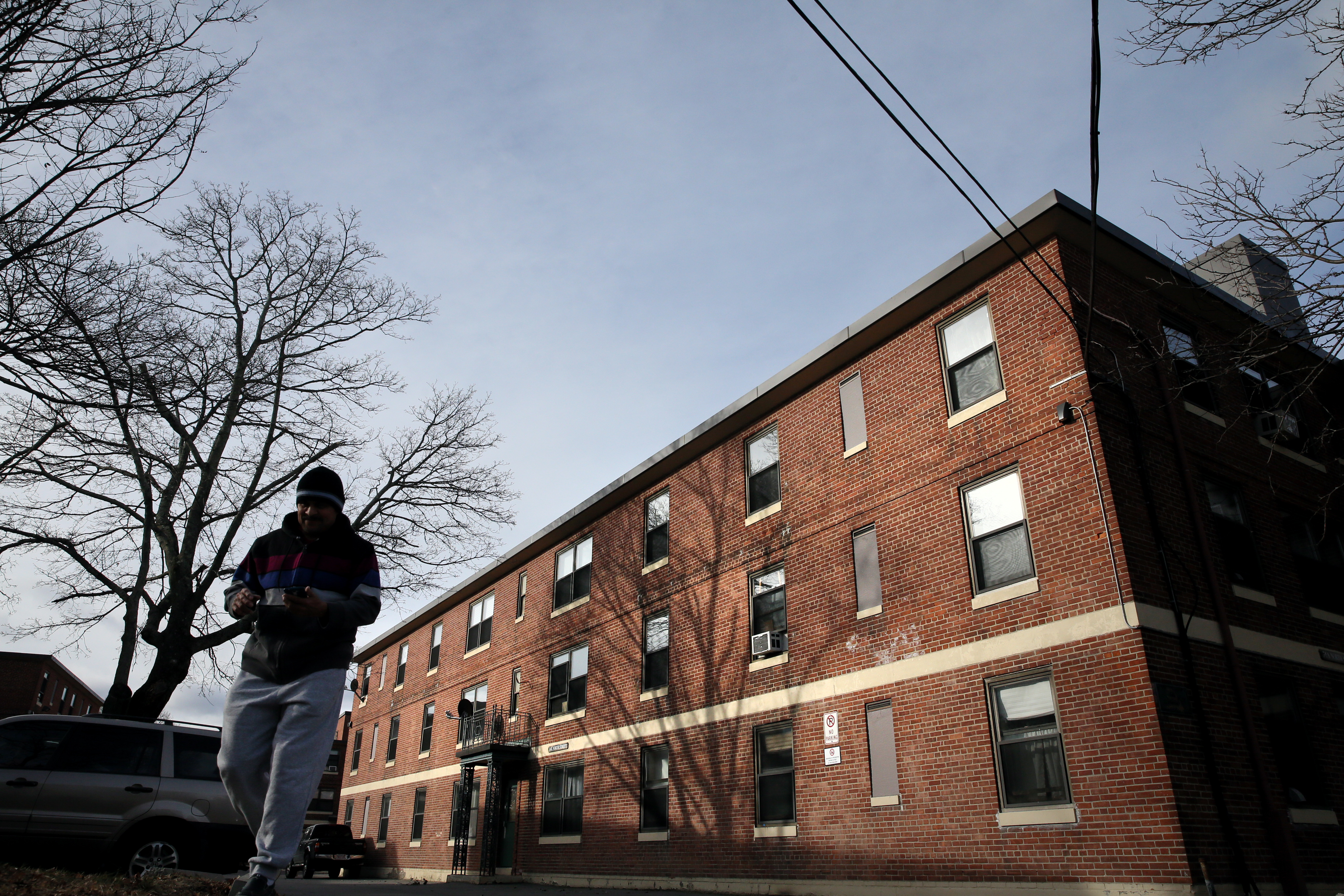 A man departed the Somerville Housing Authority's Clarendon Hill complex where redevelopment plans are on hold.