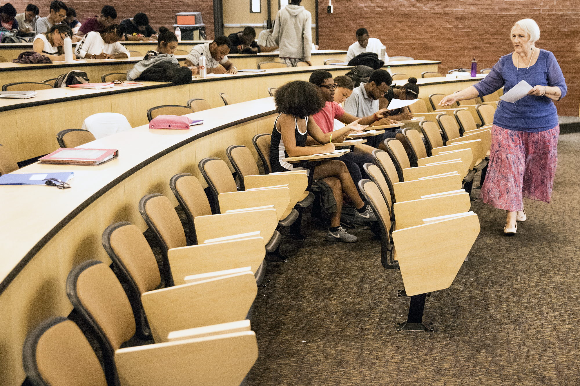 Professor Bonny Tighe assisted students as they taook an exam at UMBC.