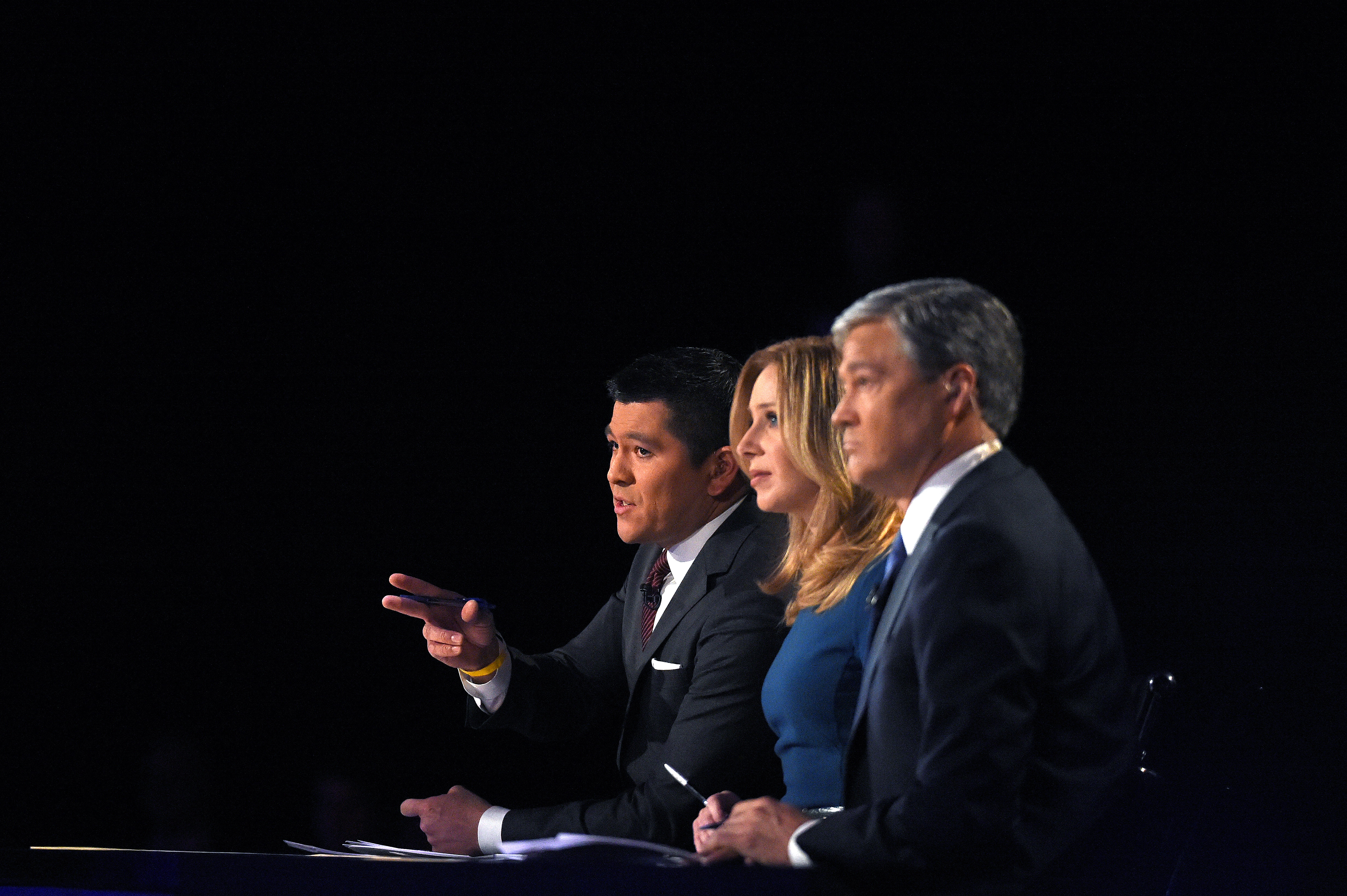Debate moderators Carl Quintanilla, left, Becky Quick, center, and John Harwood during the CNBC Republican presidential debate.