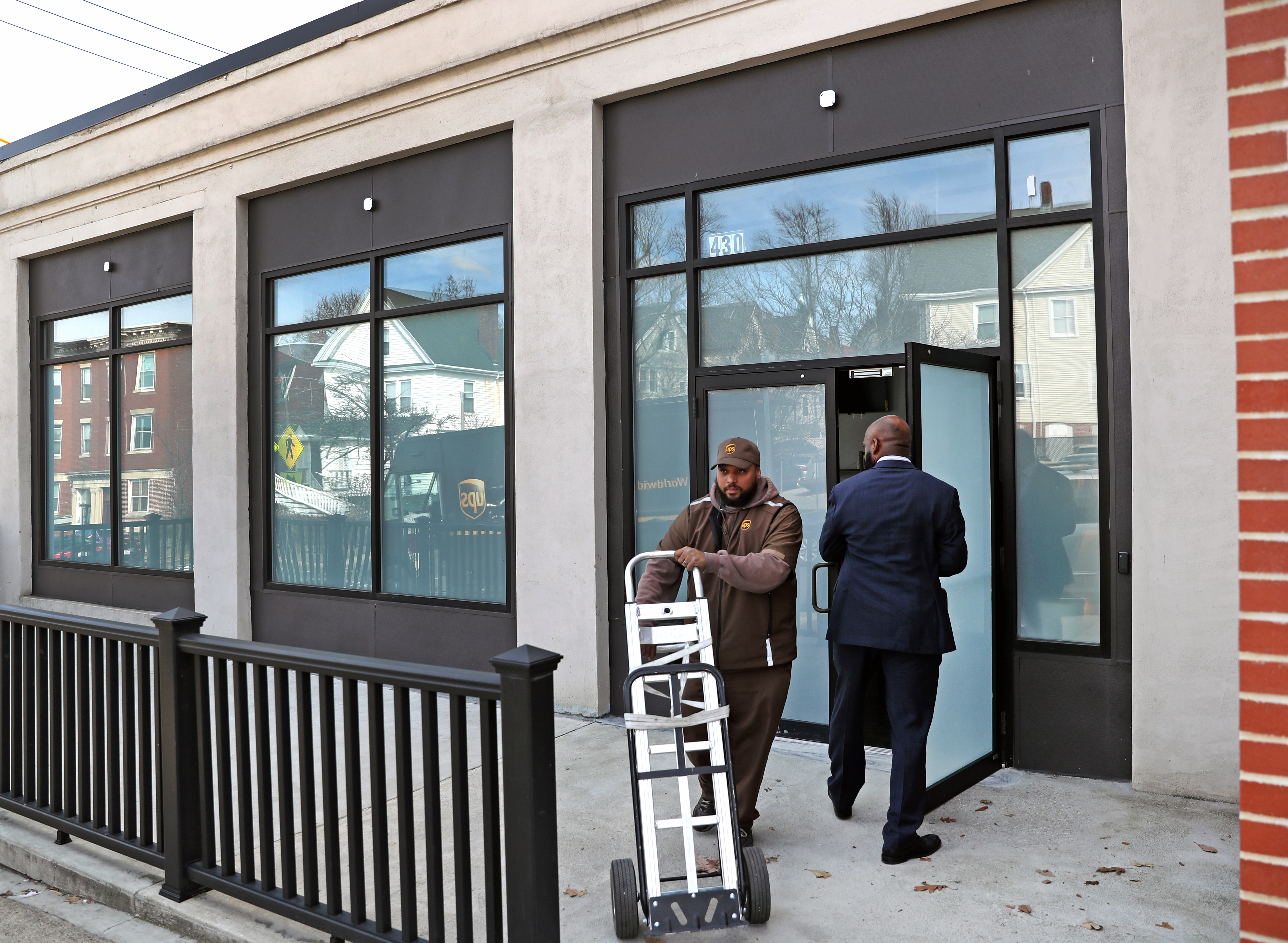 Workers prepared Pure Oasis, at 430 Blue Hill Ave., for its opening slated for Monday as Boston's first marijuana store.