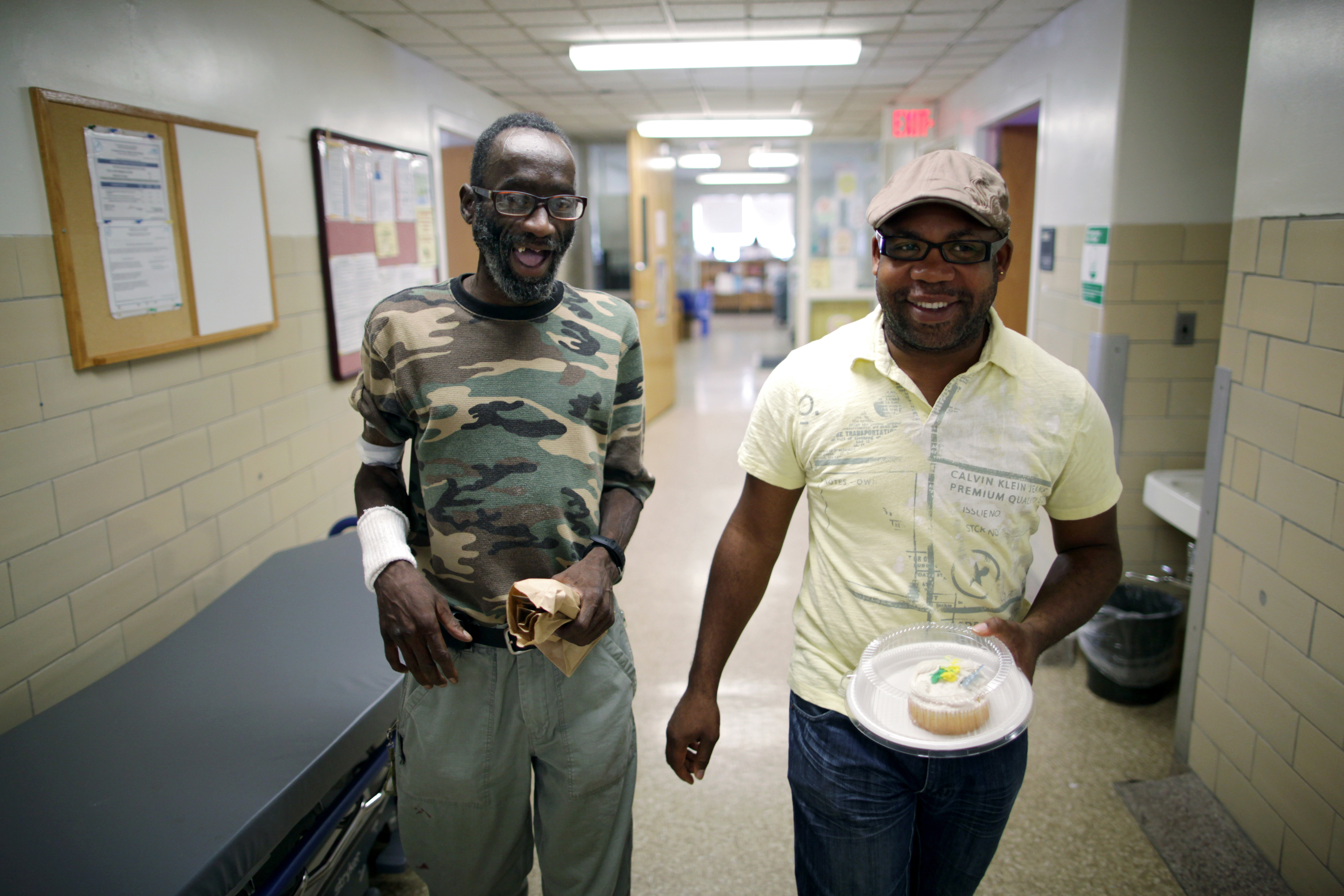 Jackson and his community health worker Gregory Jules leave the dialysis center en route to a birthday celebration.