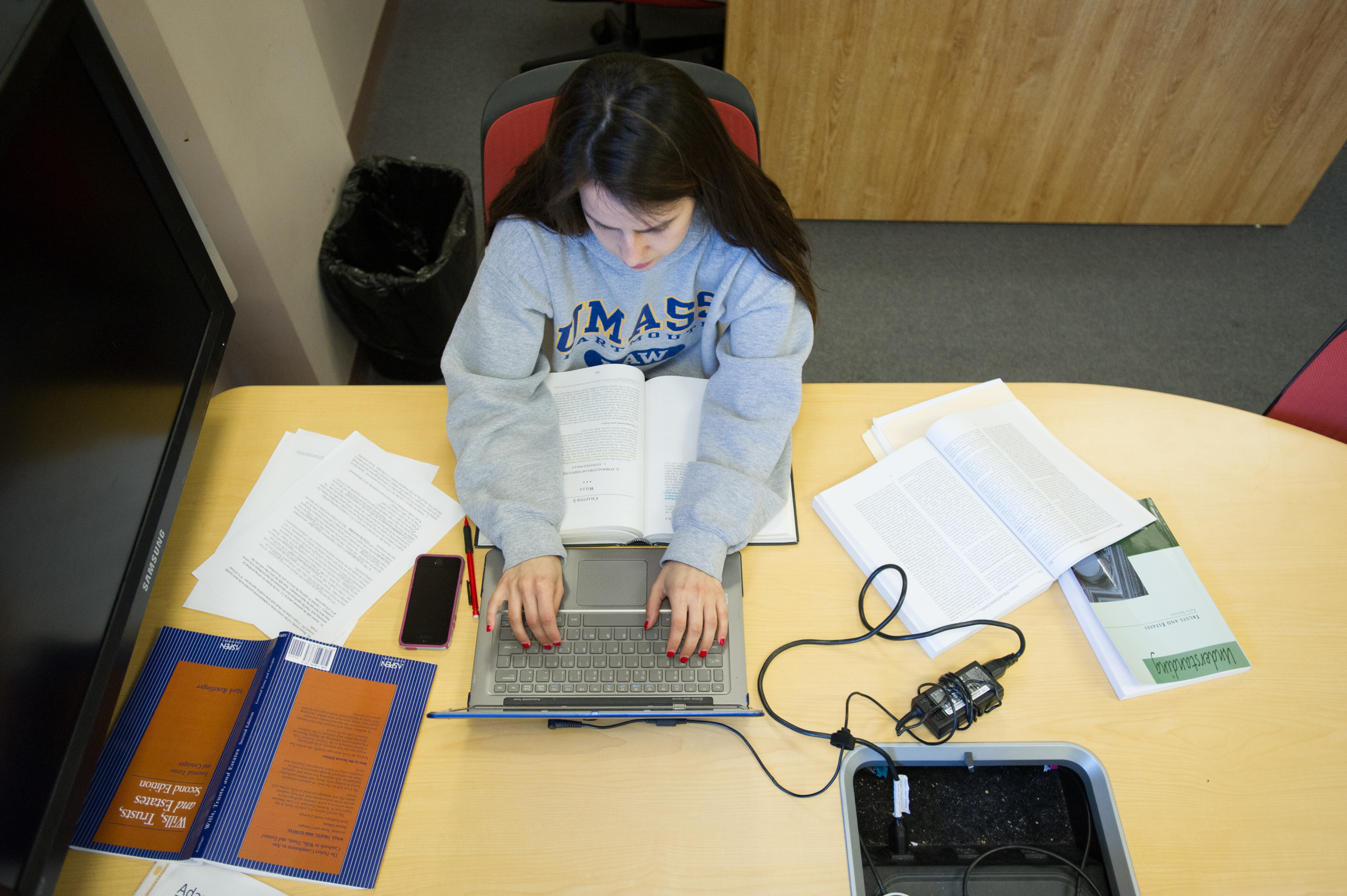 Of last year’s 81 graduates, 65 got jobs, including 31 jobs that require bar passage. Pictured: Luciana Dubuc, of Danbury, Conn., studied for her finals on Thursday.