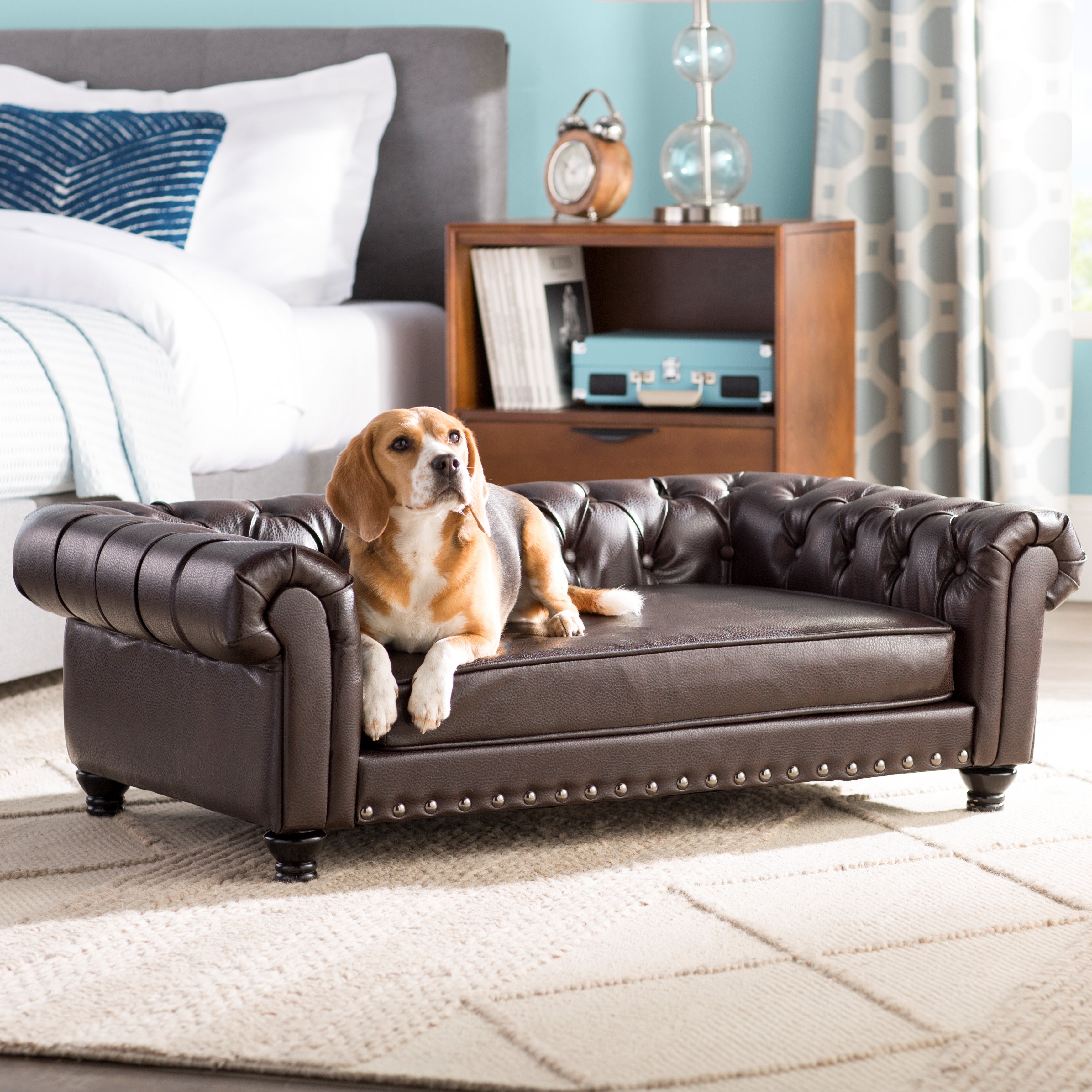 The Archie & Oscar faux leather Cornelia Dog Sofa is made to hold up to 80-pound dogs.