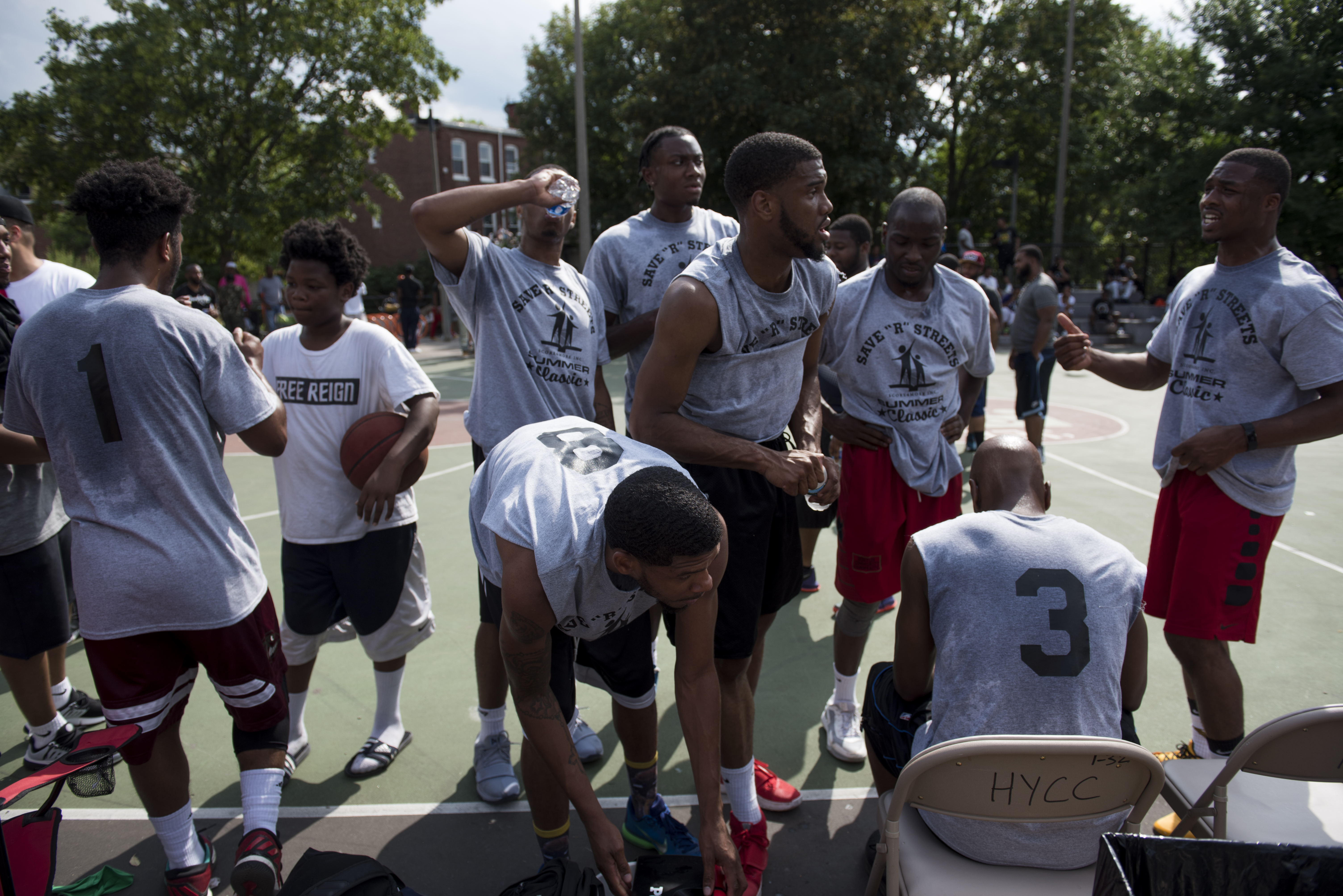 Players took a break and downed water bottles during the tournament.