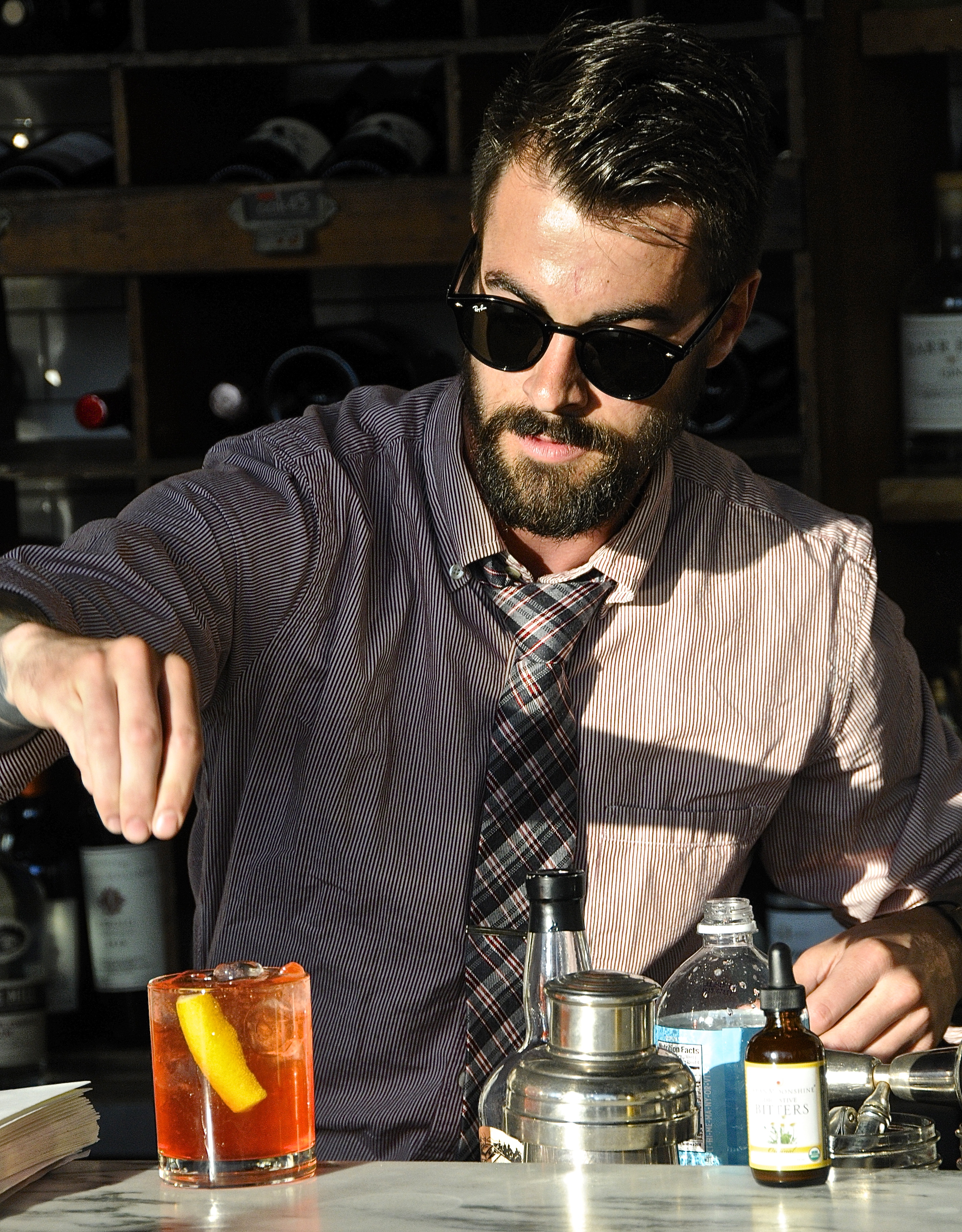 Bartender Jeff Lemieux gave a final touch to a cocktail he's made for participants in the "Cocktail Walk."
