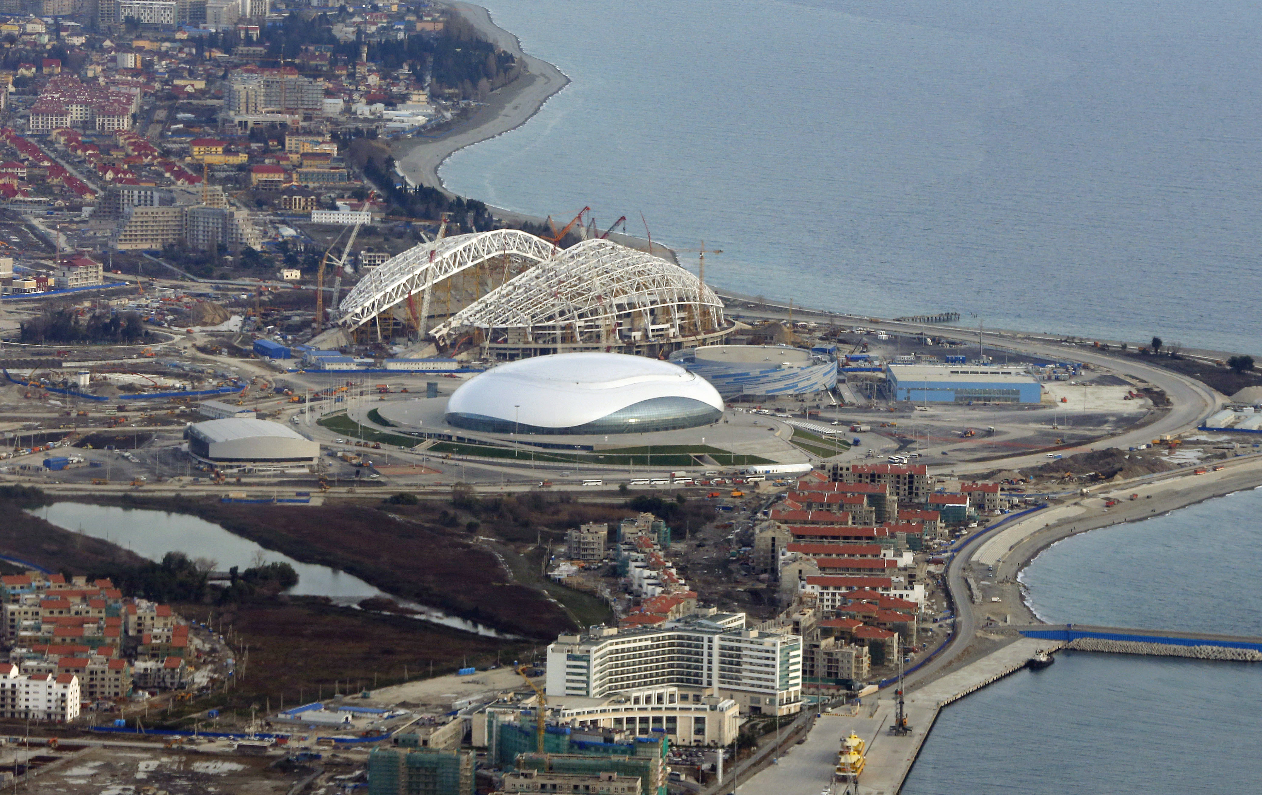 Work is continuing at many of the venues in Sochi, including the Olympic stadium.