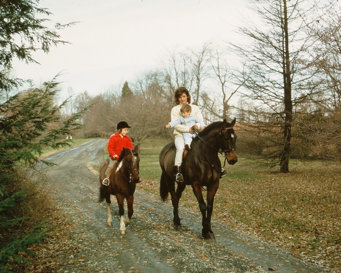 Jackie Kennedy with her son, John, and daughter, Caroline, during a ride in Middleburg, where the first family spent many weekends.