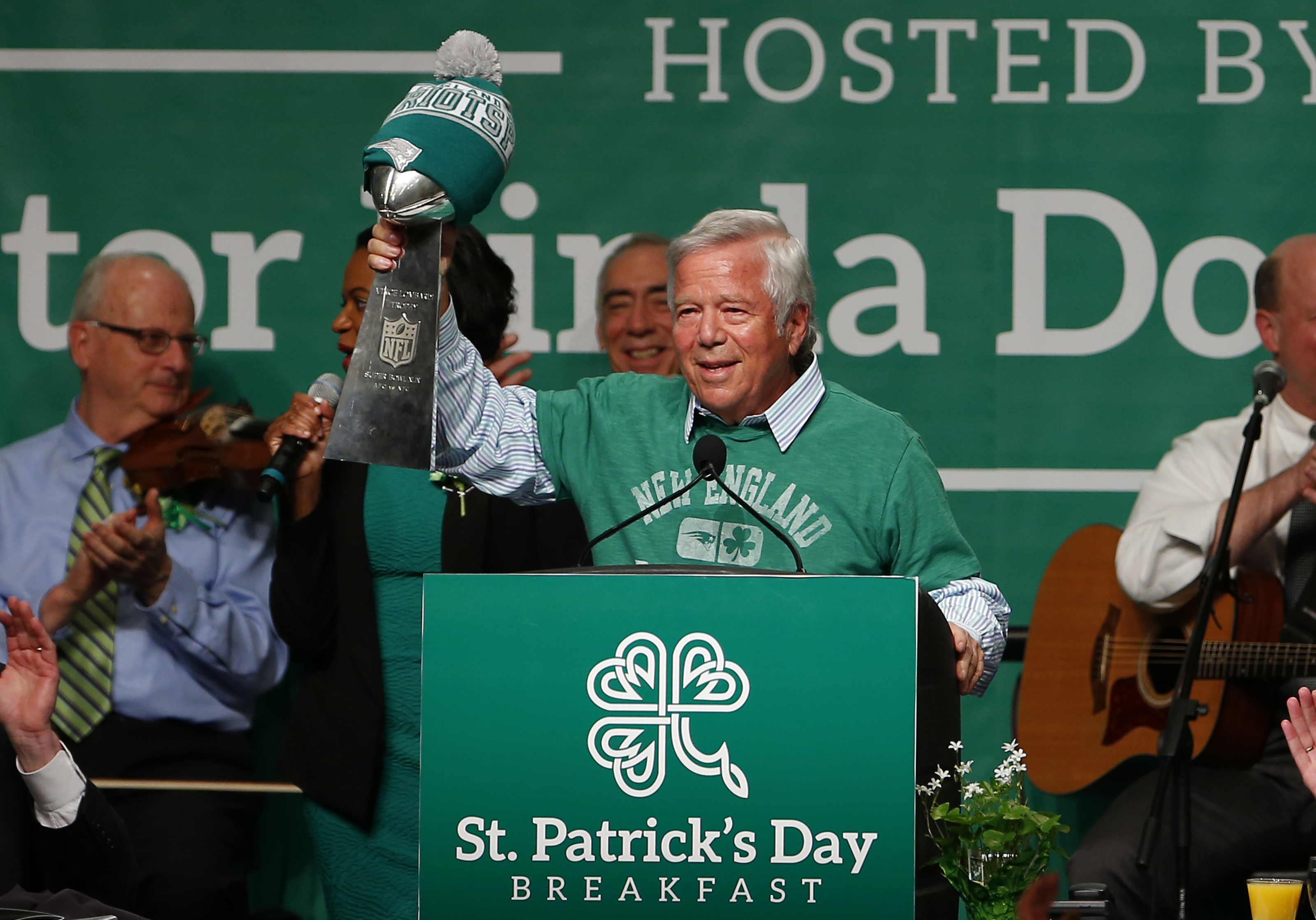 Patriots owner Robert Kraft brought along the trophy his team recently won.