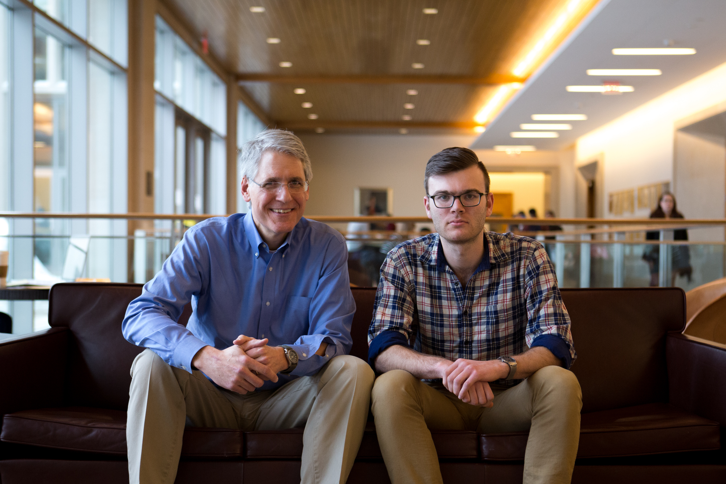 Jon Hanson (left) and Jacob Lipton at Harvard’s Wasserstein Hall. The two are leading the new Systemic Justice Project at Harvard.