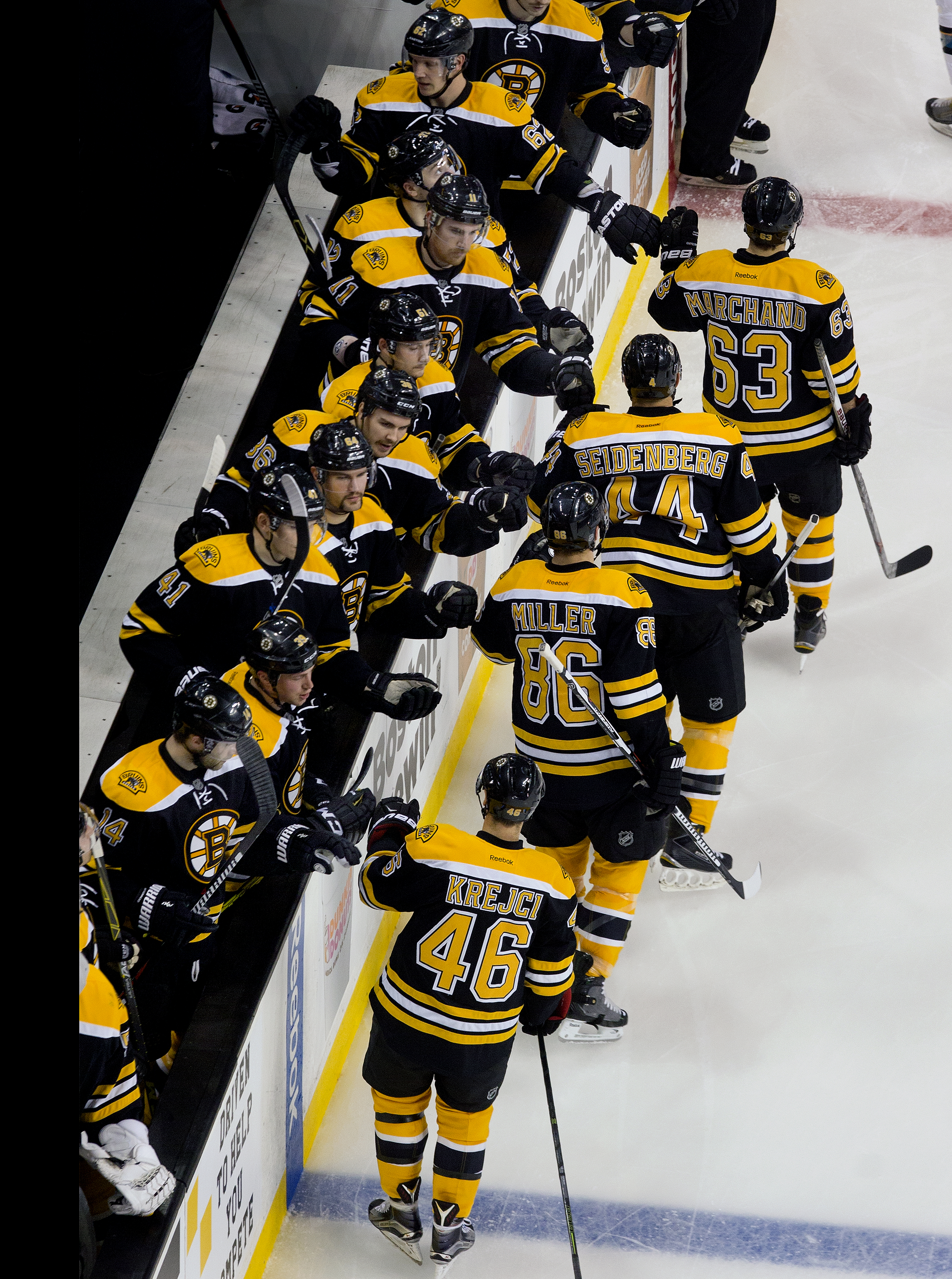The Bruins fist-bumped after a goal earlier this season.