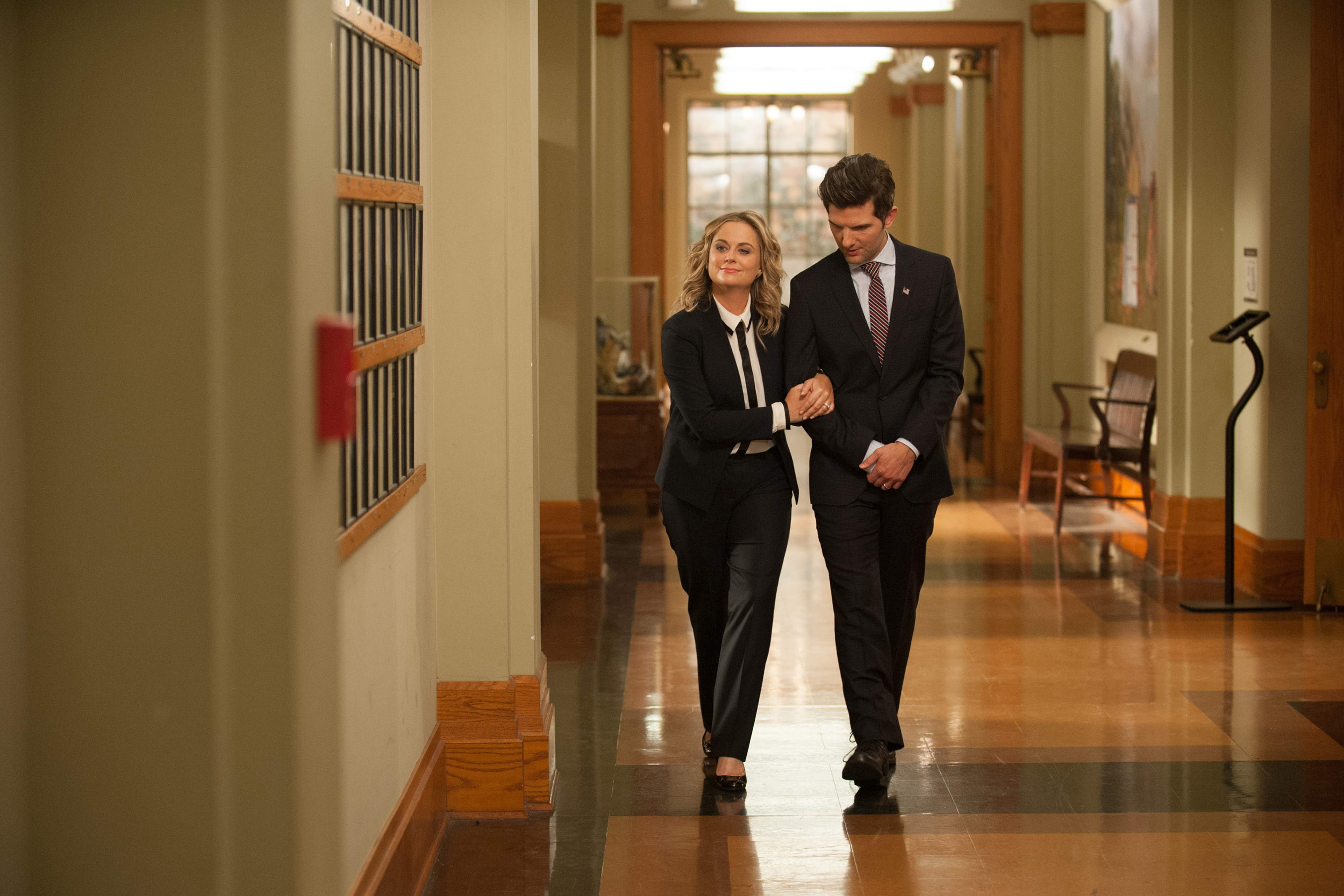 Amy Poehler as Leslie Knope and Adam Scott as Ben Wyatt.