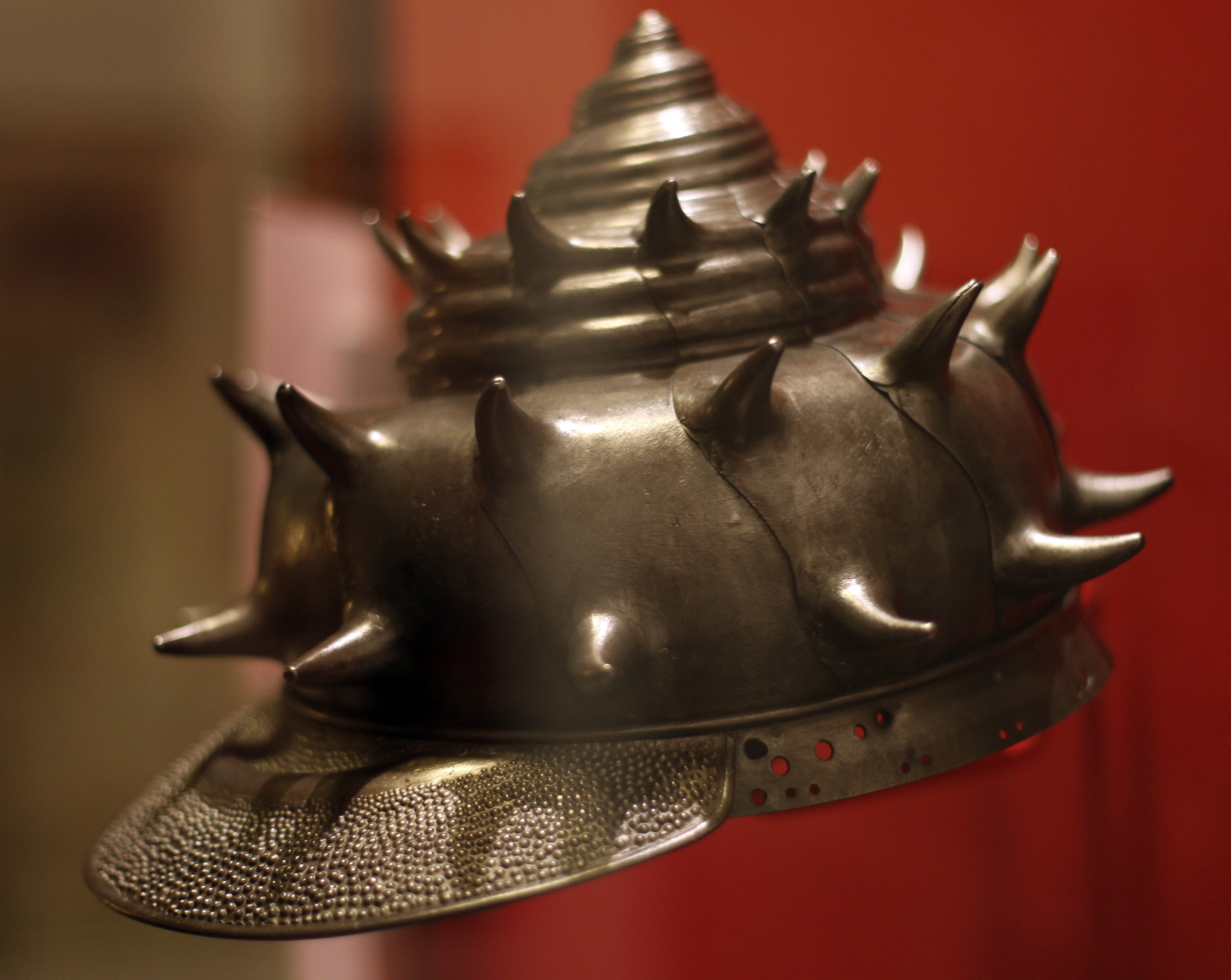 A Japanese helmet in the form of a conch shell is one of the items on display.