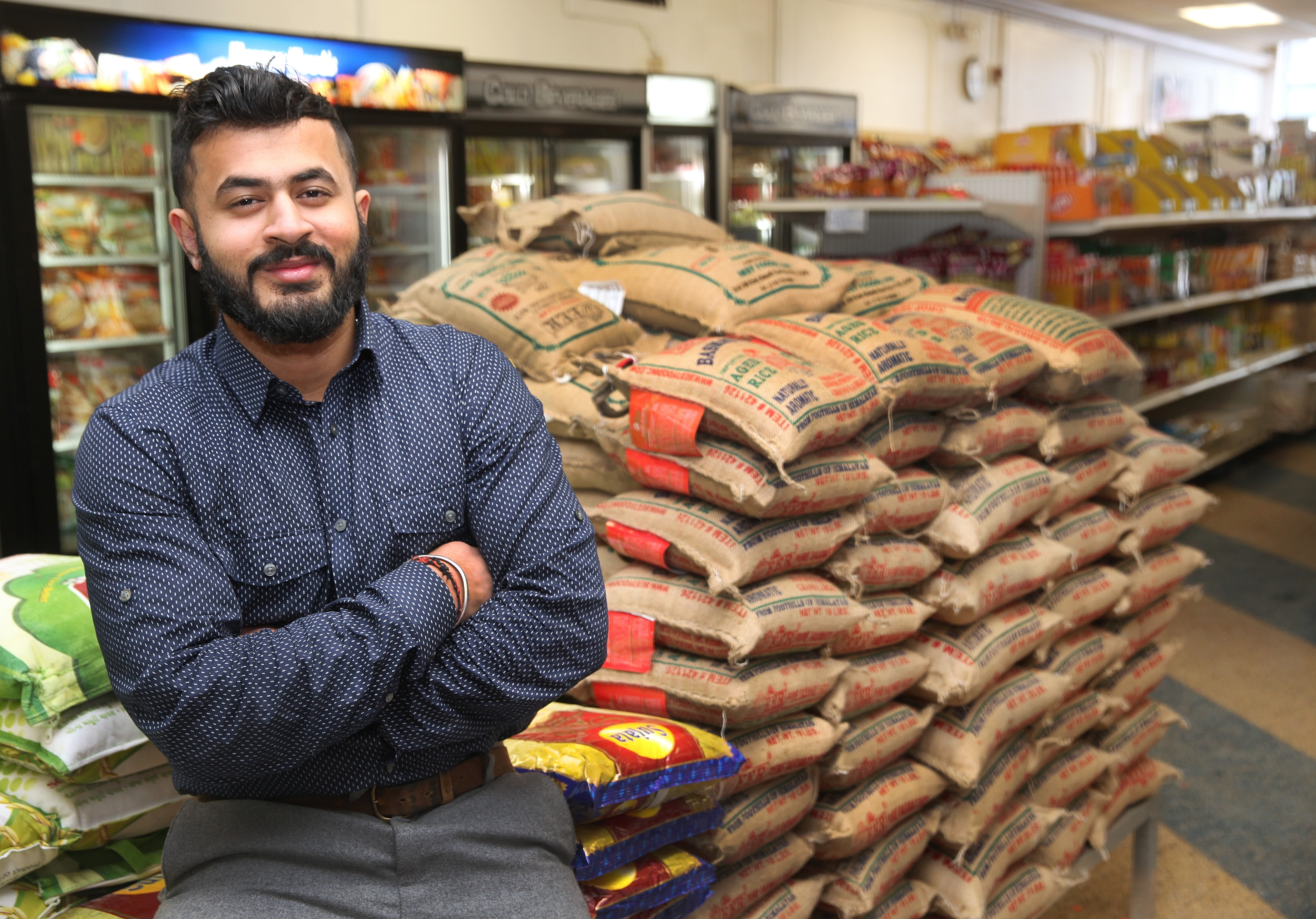 Varun Punj owns Indian Bazaar, a food store, one of the oldest Asian businesses in the city.